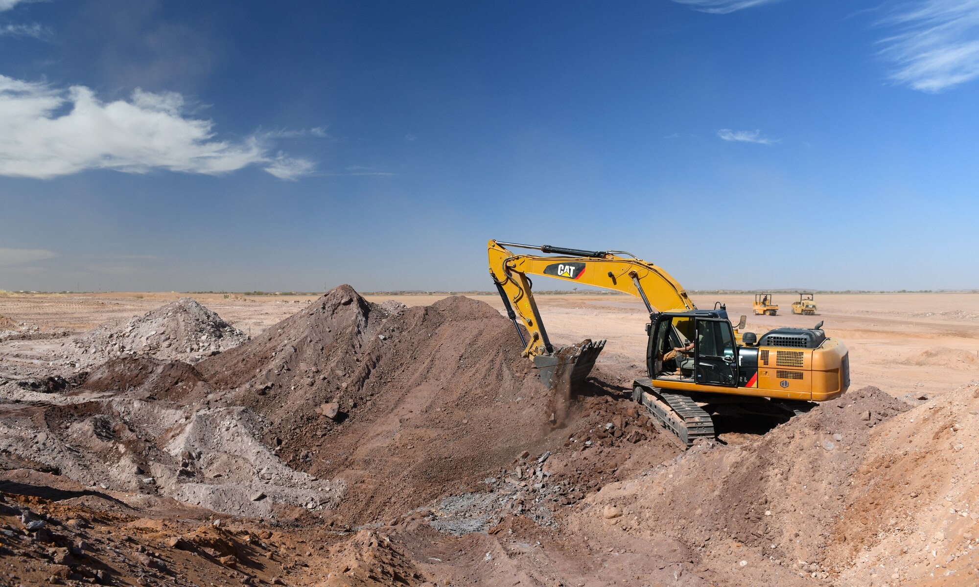 A U.S. Airman deployed with the 819th Expeditionary Rapid Engineer Deployable Heavy Operational Repair Squadron Engineer team uses an excavator to dig up the earth at Nigerien Air Base 201, Niger, Dec. 13, 2019. In Niger, deployed RED HORSE teams are continually improving base infrastructure and building new facilities for current and future missions. (U.S. Air Force photo by Staff Sgt. Alex Fox Echols III)