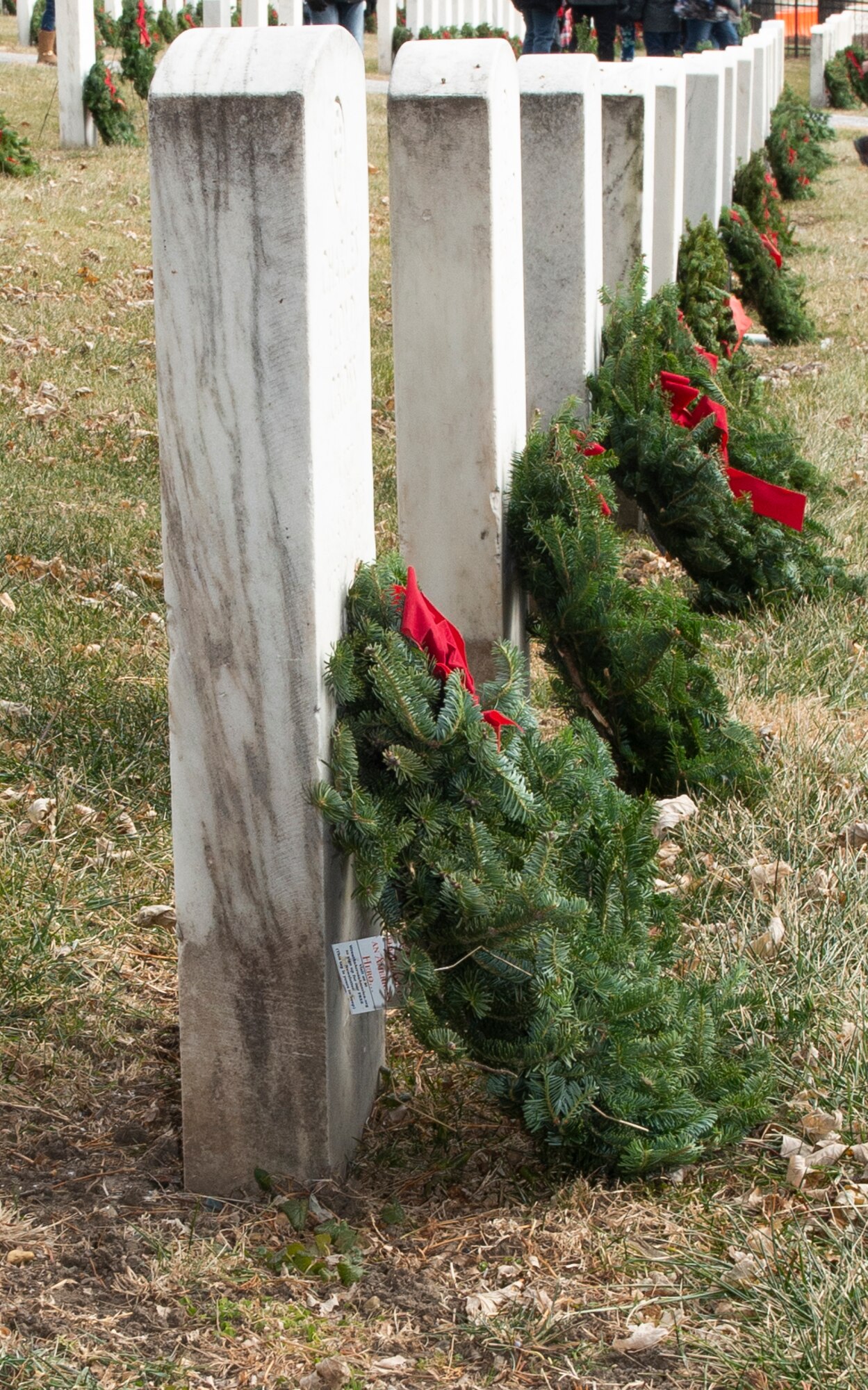 Photo of wreaths leaning on a headstone at Offutt Air Force Base.