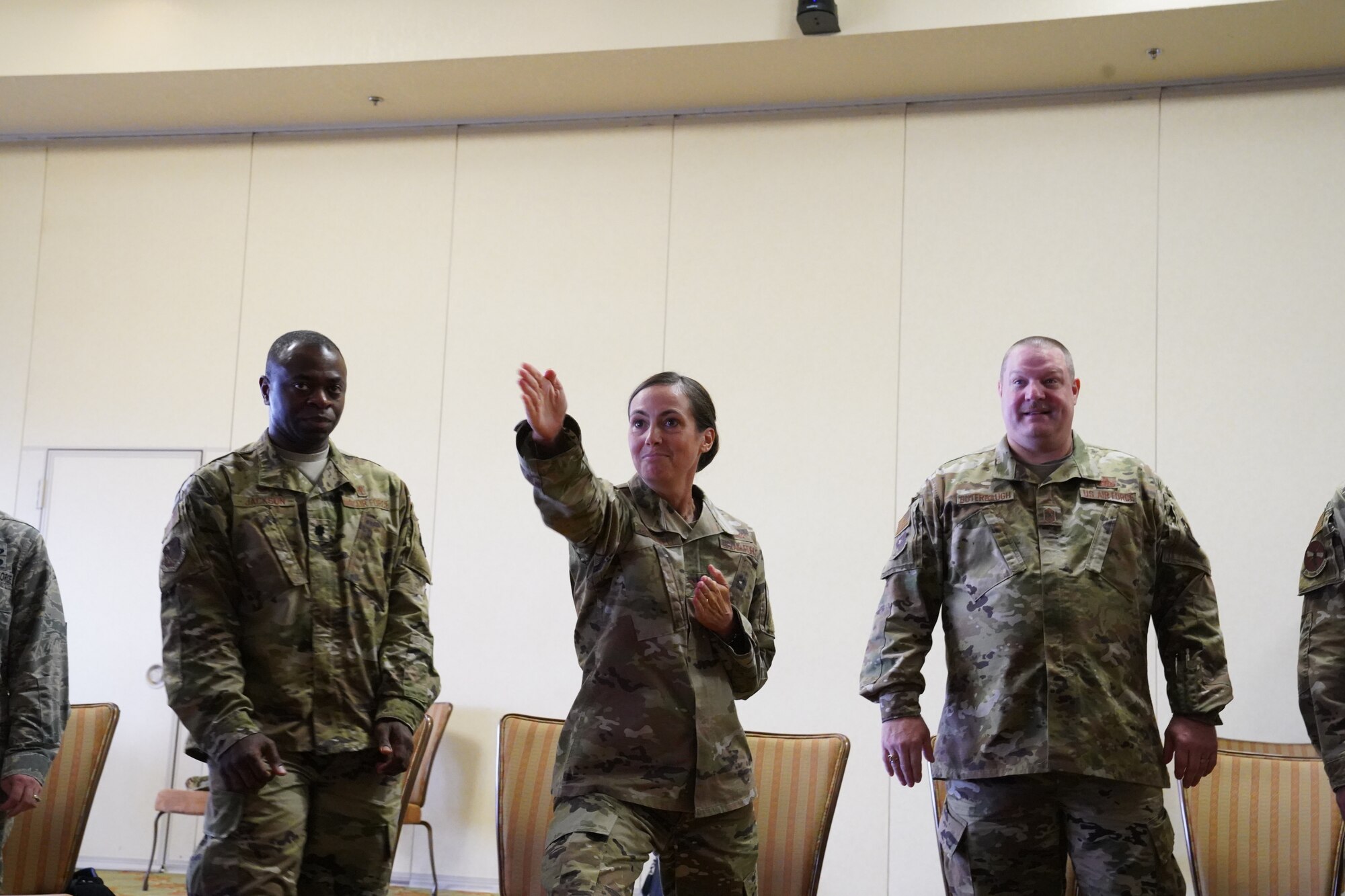 U.S. Air Force Col. Heather Blackwell, 81st Training Wing commander, Lt. Col. Norris Jackson, 81st Surgical Operations Squadron commander, and CMSgt. Charles Buterbaugh, 333rd Training Squadron superintendent, participate in an activity for the 'Improv to Improve' course in the Bay Breeze Event Center at Keesler Air Force Base, Mississippi, Dec. 10, 2019. Improv to Improve is an improvisation comedy resiliency class that engages military members in a safe interactive learning environment. The purpose of the class is to help combat life stress and adversity in an unconventional way. (U.S. Air Force photo by Airman 1st Class Spencer Tobler)