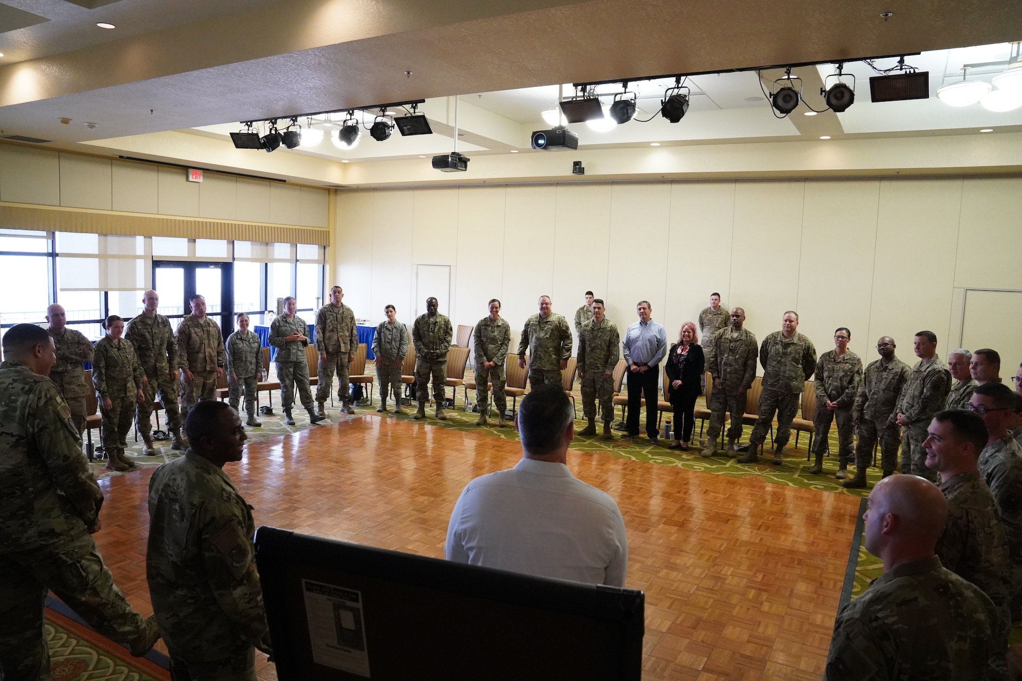 U.S. Air Force Airmen gather for an 'Improv to Improve' course in the Bay Breeze Event Center at Keesler Air Force Base, Mississippi, Dec. 10, 2019. Improv to Improve is an improvisation comedy resiliency class that engages military members in a safe interactive learning environment. The purpose of the class is to help combat life stress and adversity in an unconventional way. (U.S. Air Force photo by Airman 1st Class Spencer Tobler)