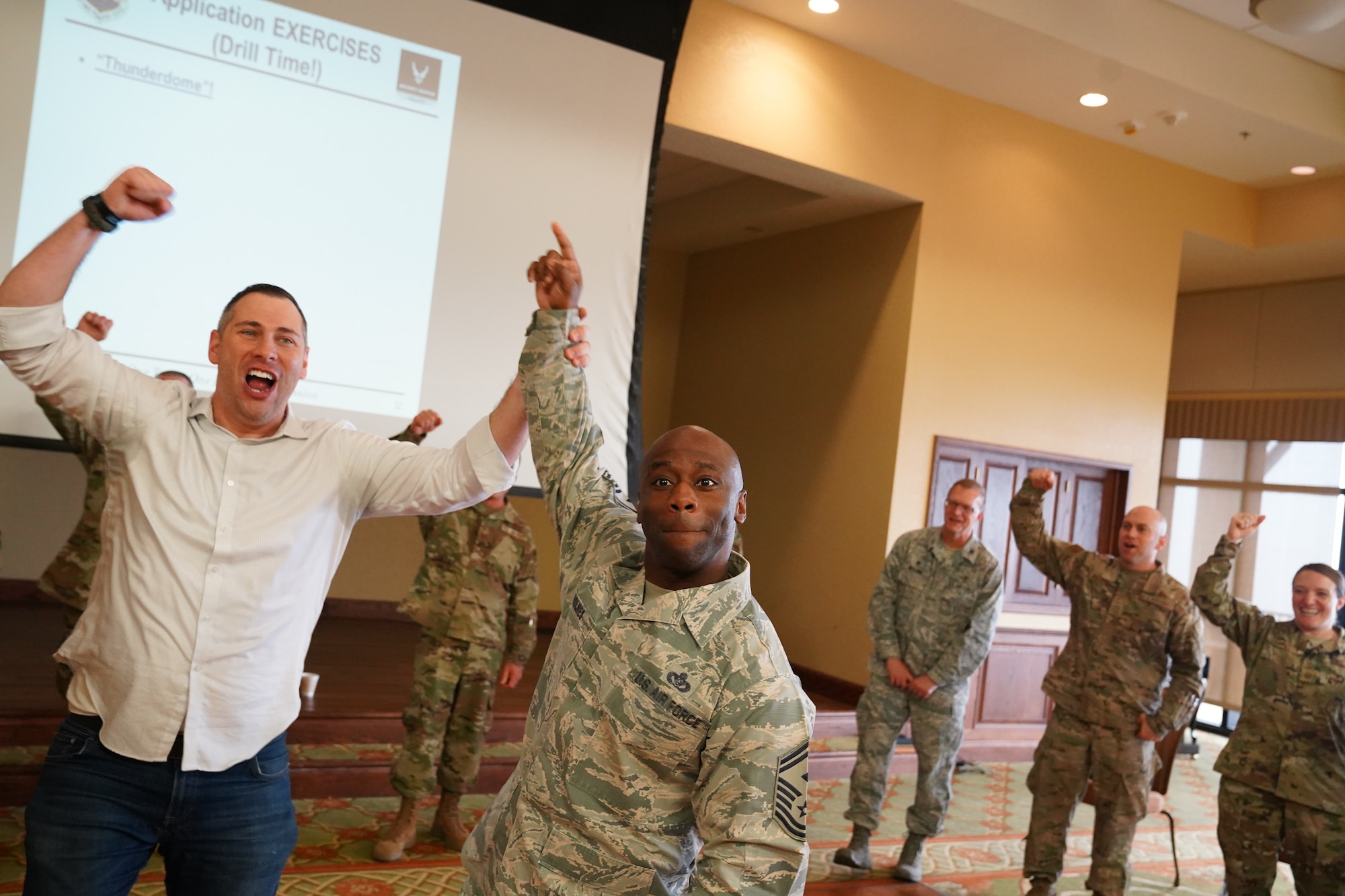 Senior Master Sgt. Patrick Holmes, 335th Training Squadron first sergeant, participates in the Improv to Improve course in the Bay Breeze Event Center at Keesler Air Force Base, Mississippi, Dec. 10, 2019. Improv to Improve is an improvisation comedy resiliency class that engages military members in a safe interactive learning environment. The purpose of the class is to help combat life stress and adversity in an unconventional way. (U.S. Air Force photo by Airman 1st Class Spencer Tobler)