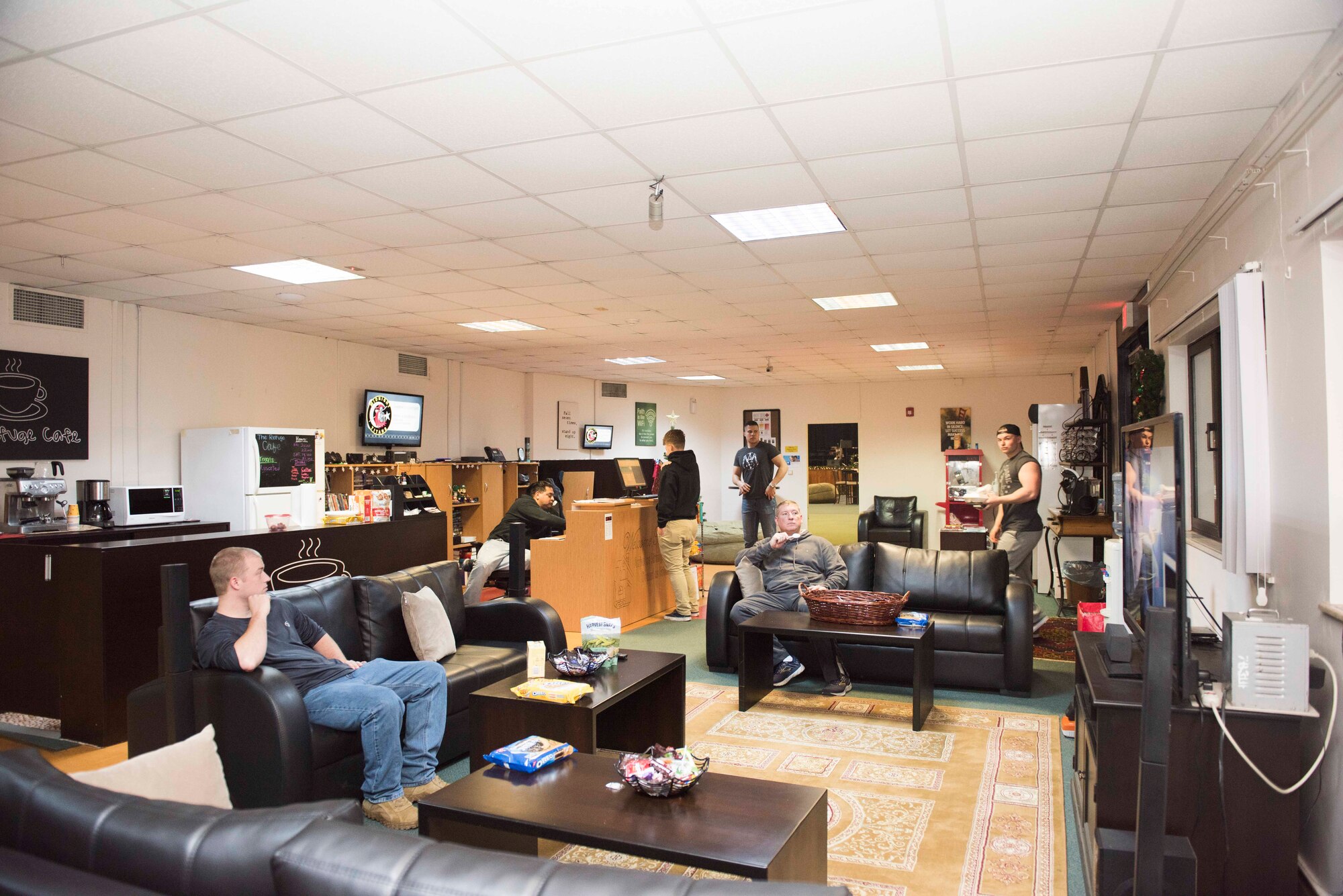 Image of Airmen sitting and relaxing