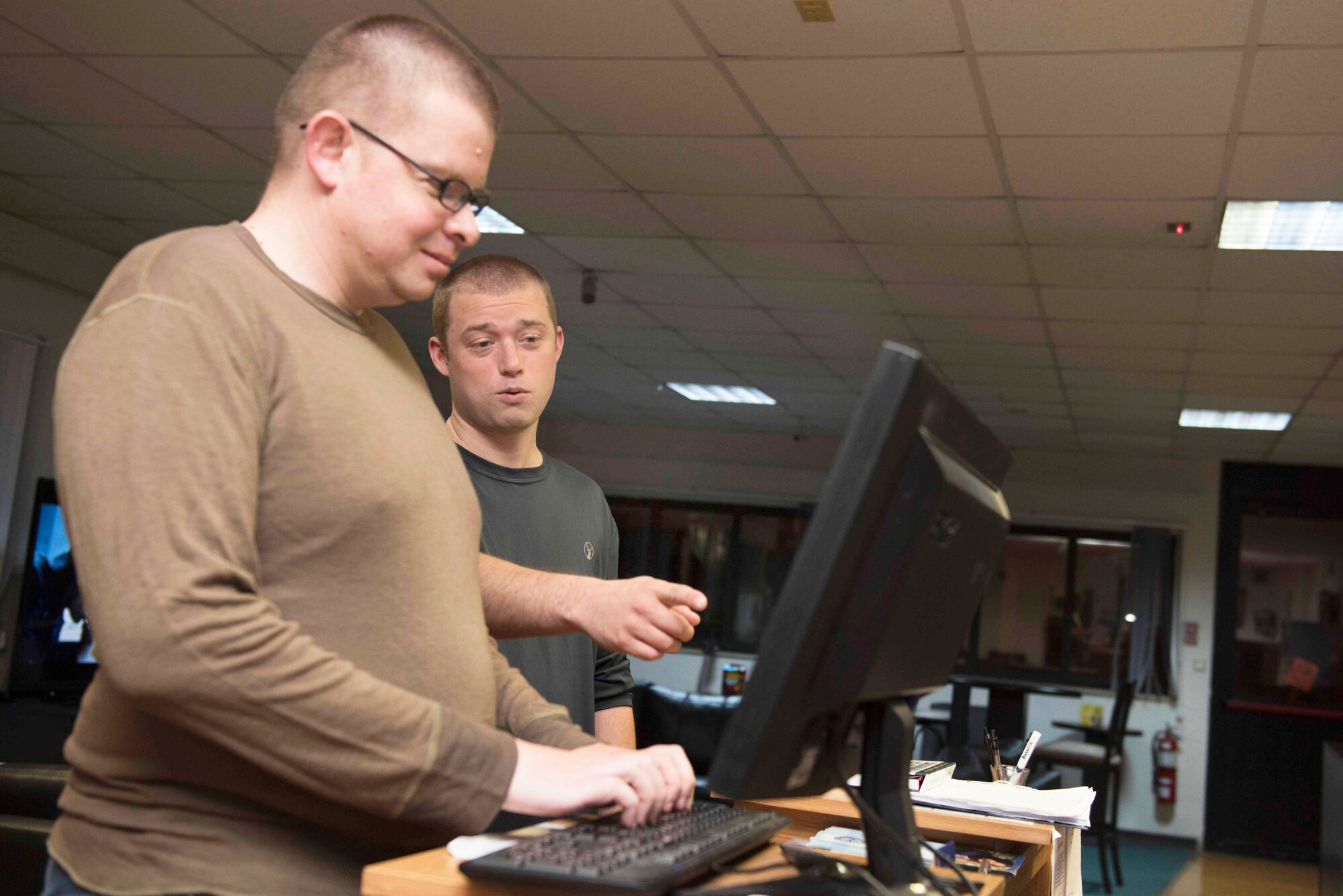 Image of Airmen on computer