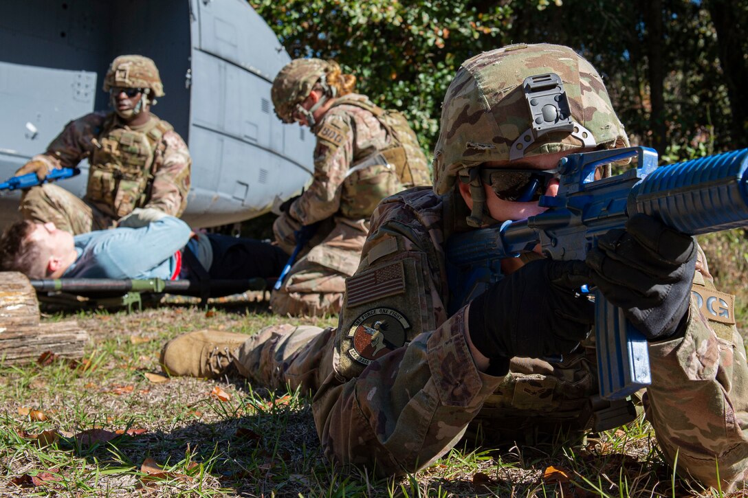 Photo of an Airman preforms security during the Combat Lifesavers Course.