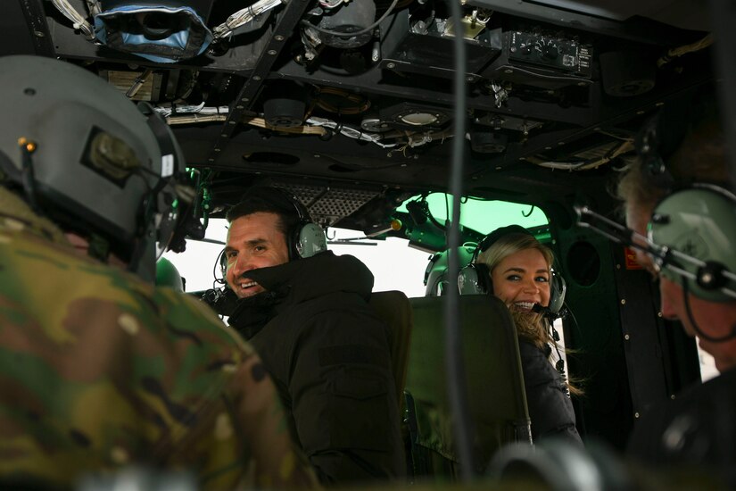 Ryan Zimmerman (left), Washington Nationals first baseman, and his wife, Heather, ride in a 1st Helicopter Squadron UH-1N Iroquois during a World Series display event at Joint Base Andrews, Md., Dec. 17, 2019. Zimmerman spent the afternoon on base and met Airmen, signed autographs and took photos with fans. (U.S. Air Force photo by Airman 1st Class Essence Myricks)