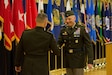 Two male Soldiers shake hands