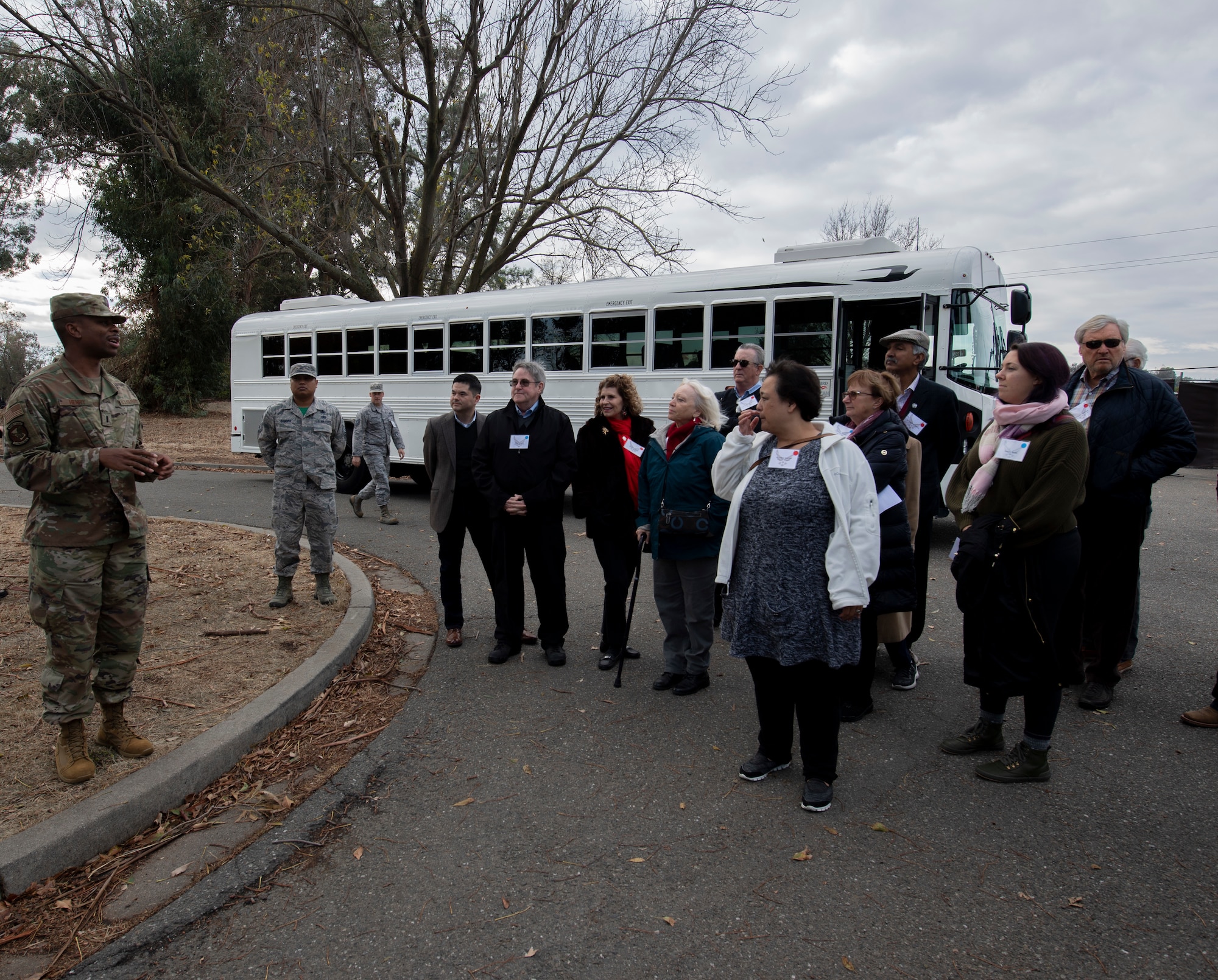 U.S. Air Force 1st Lt. Daniel Henry, left, 60th Civil Engineer Squadron officer, briefs honorary commanders about construction during the 60th Mission Support Group honorary commanders tour Dec. 6, 2019, at Travis Air Force Base, California. Travis AFB’s honorary commander program allows base leadership to develop relationships with local, civic and business leaders. It also gives the opportunity to learn about the surrounding communities. (U.S. Air Force photo by Senior Airman Jonathon Carnell)