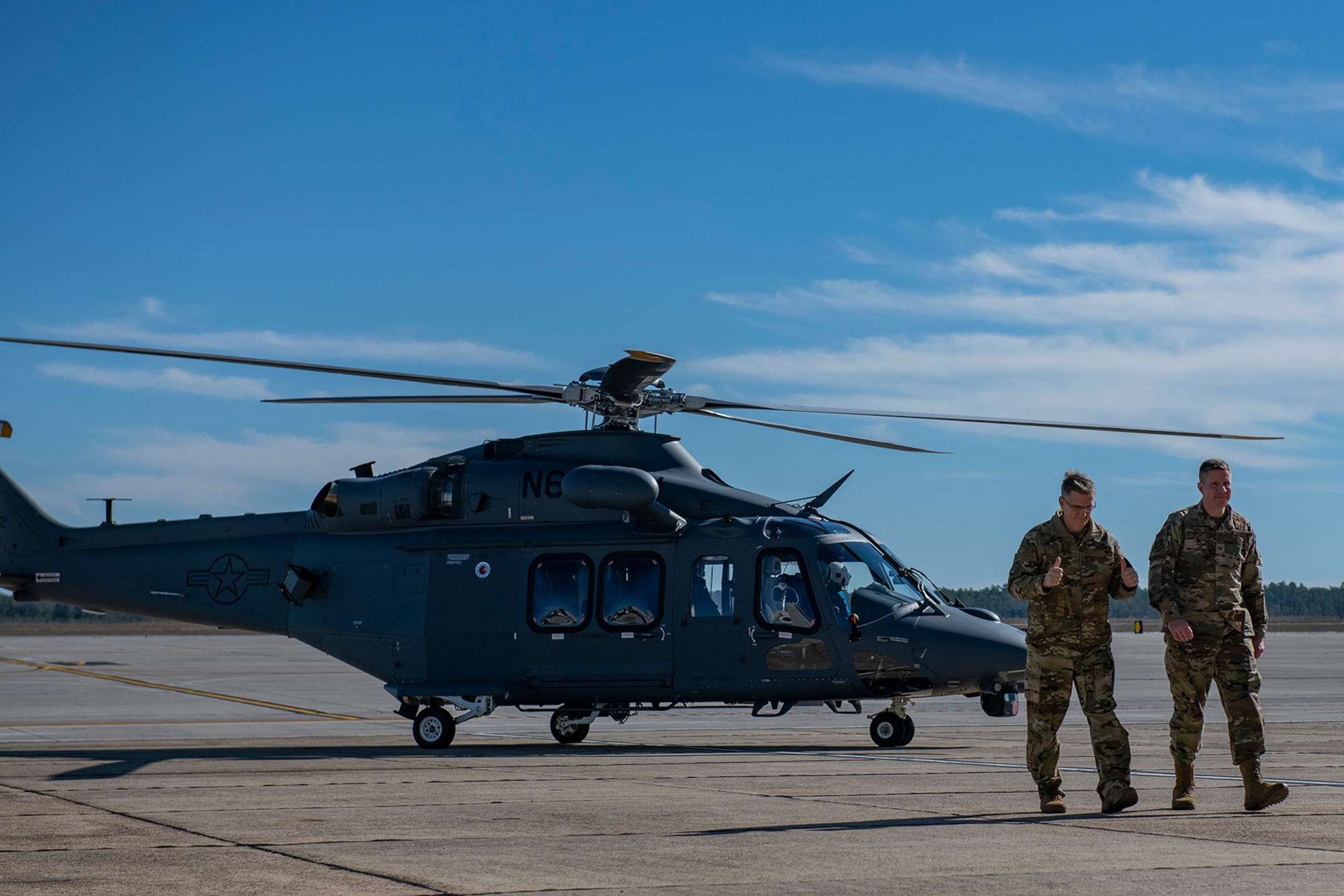 General Ray and Col. Jiru walk away from MH-139