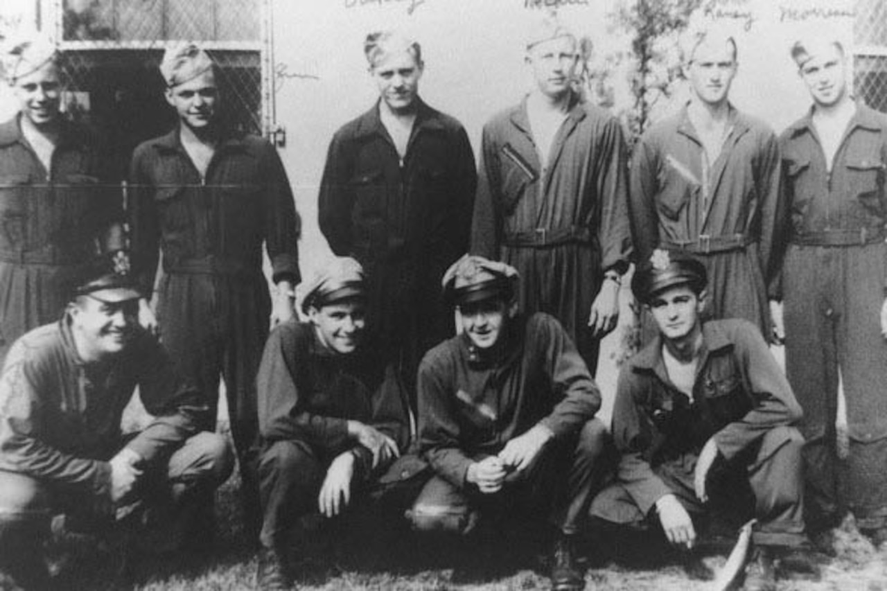 A group poses for a photo.