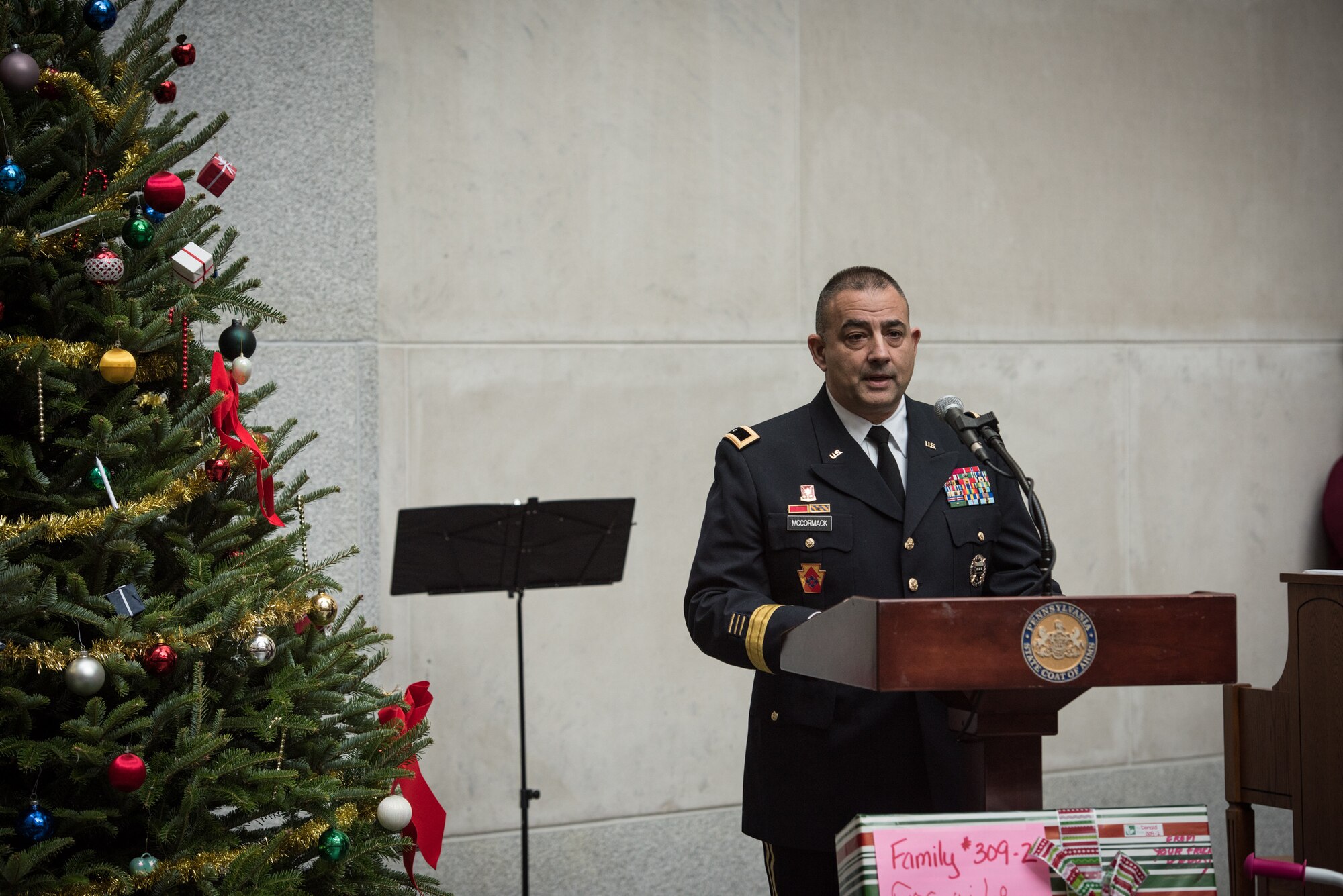 U.S. Army Brig. Gen. Mark D. McCormack, Deputy Commanding General of Support for the 28th Infantry Division, Pennsylvania National Guard, speaks during a ceremony for the 30th Annual Holiday Wish Program.