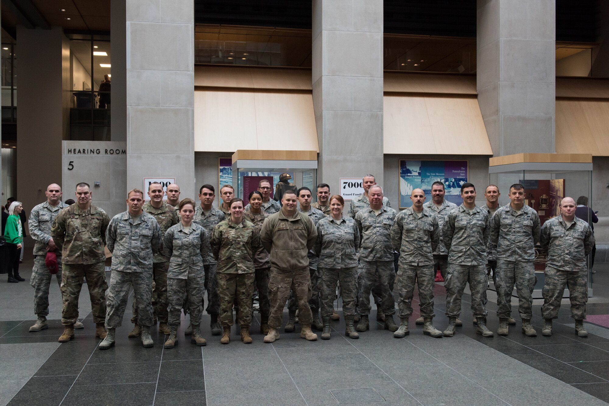 U.S. Airmen from the 193rd Special Operations Wing, Pennsylvania Air National Guard, gather together during the 30th Annual Holiday Wish Program.