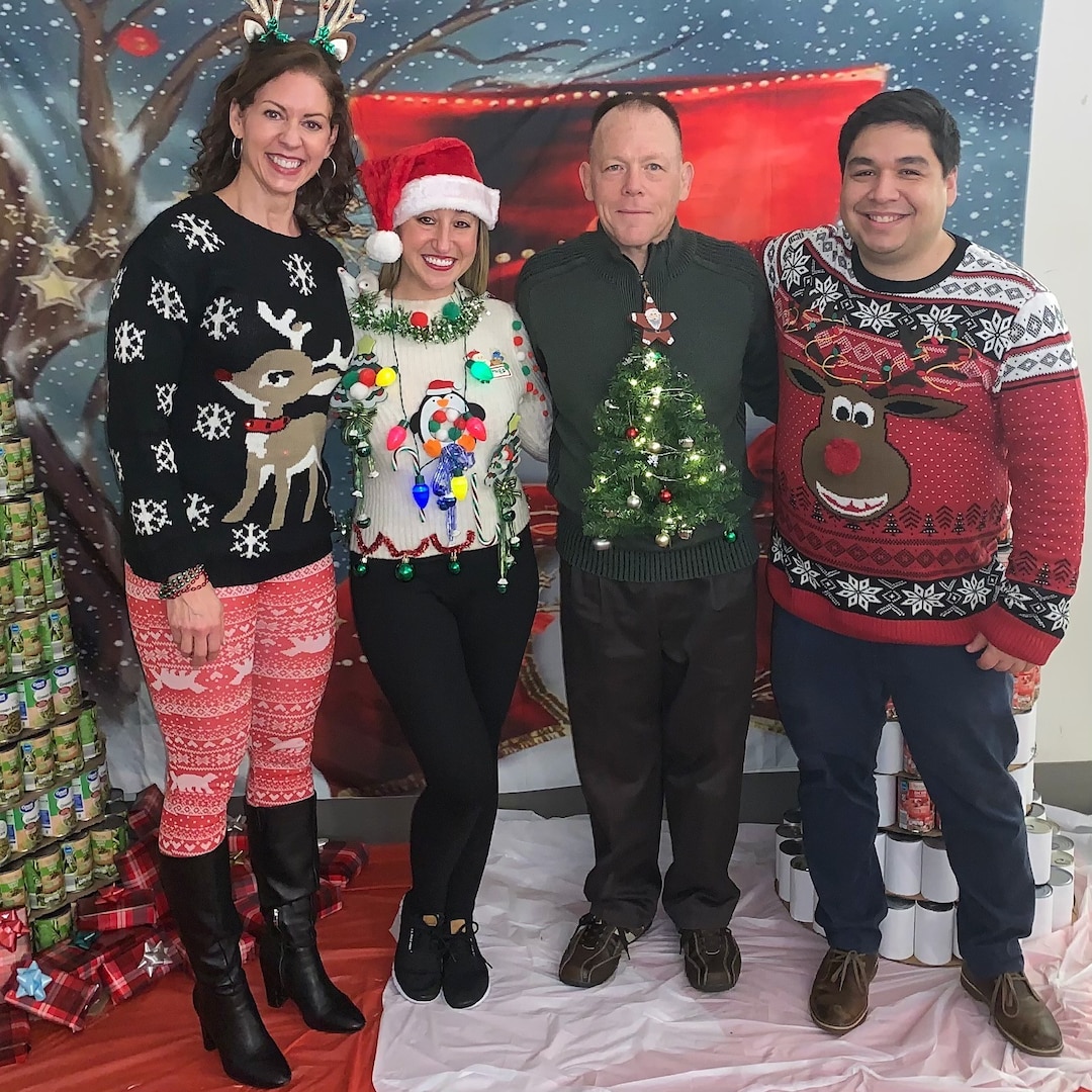 Medical employees pose for a photo during the Medical Culture Improvement Team Ugly Holiday Sweater Day at DLA Troop Support Dec. 17, 2019 in Philadelphia.