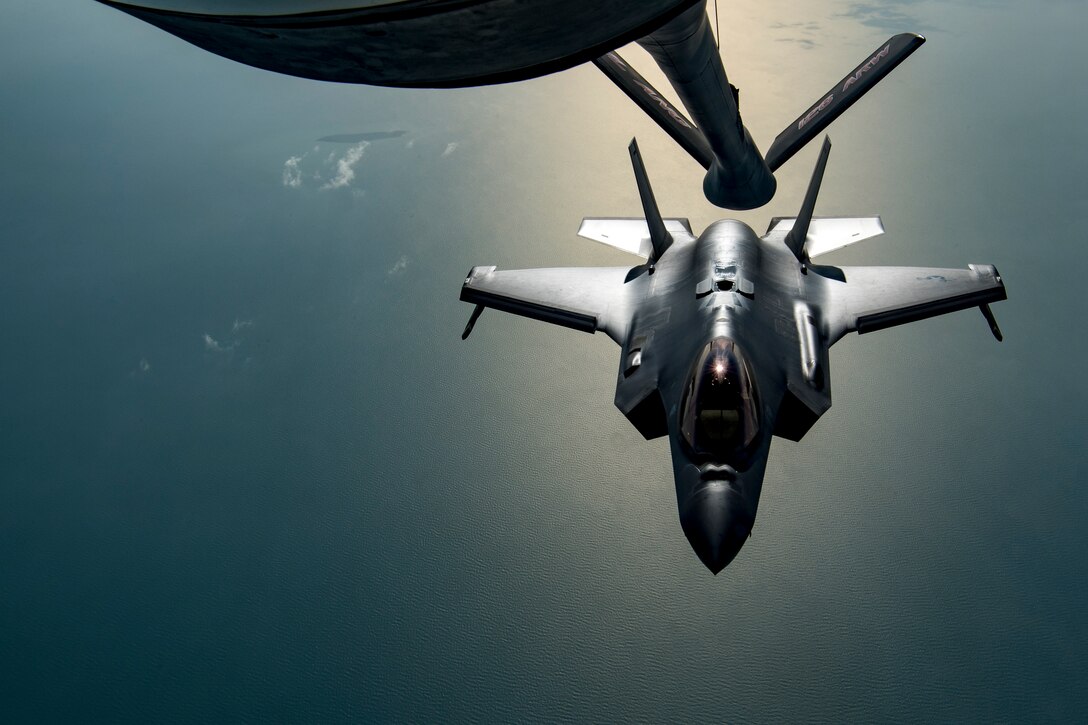 A U.S. Air Force F-35A Lightning II assigned to the 34th Expeditionary Fighter Squadron departs after conducting an aerial refueling with A U.S. Air Force KC-135 Stratotanker assigned to the 28th Expeditionary Air Refueling Squadron above the Arabian Gulf, Dec. 3, 2019.