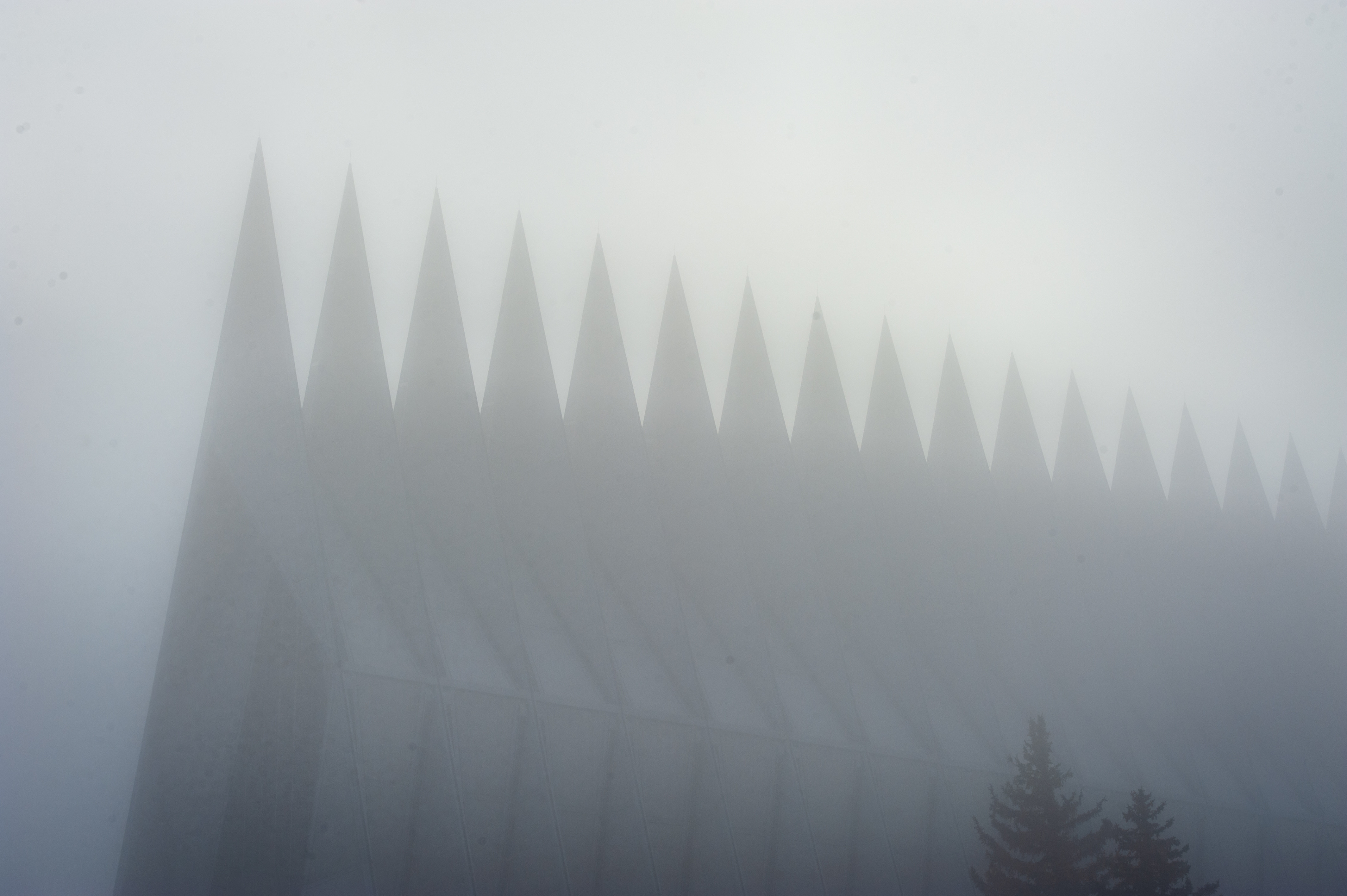 The Cadet Chapel peeks through the fog on a cold November day at the U.S. Air Force Academy. (U.S. Air Force photo by Tech. Sgt. Benjamin W. Stratton)