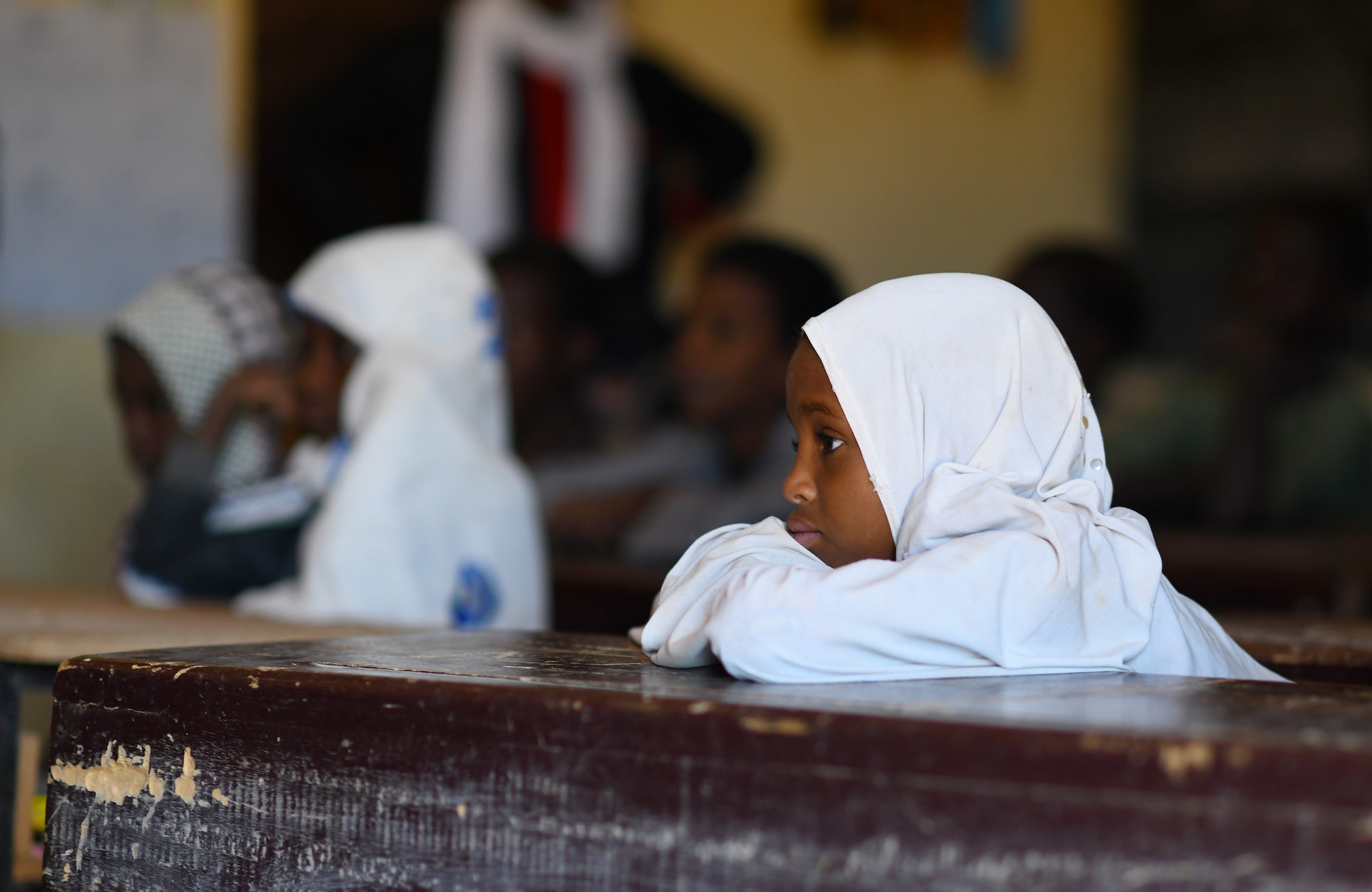 Local school children attend a dental hygiene course in the village of Tsakatalam, Niger, Dec. 14, 2019. The U.S. Army 443rd Civil Affairs Battalion Civil Affairs Team 219 deployed to Nigerien Air Base 201 partnered with local Agadez city dentist, Dr. Mahaman Aicha, to teach the Tsakatalam Primary School students for the first time how to properly brush and floss their teeth and the importance of good oral health. (U.S. Air Force photo by Staff Sgt. Alex Fox Echols III)
