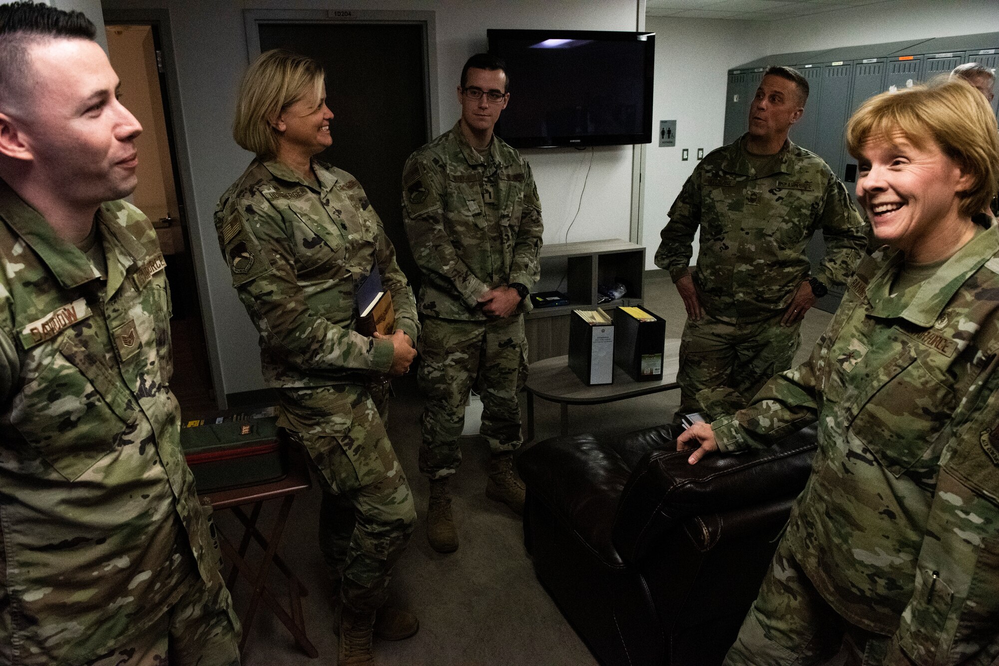 U.S. Air Force Staff Sgt. Troy Davidow, 325th Operational Medical Readiness Squadron Ambulance Services Department technician, left, briefs U.S. Air Force Brig. Gen. Sharon Bannister, Air Combat Command Surgeon General, right, at Tyndall Air Force Base, Florida, Dec, 18, 2019. The Ambulance Services Department works around the clock to assist with emergency medical response and transport for the installation and local Bay County, Florida. (U.S. Air Force photo by Staff Sgt. Magen M. Reeves)