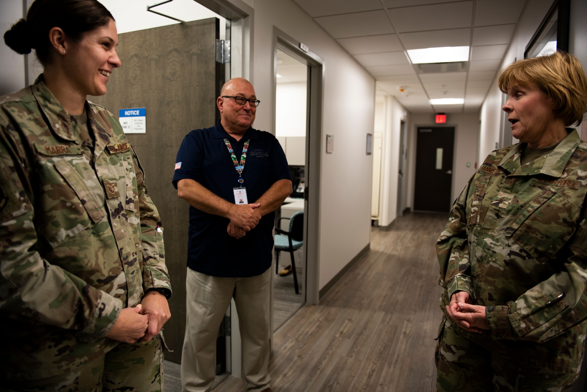 U.S. Air Force Staff Sgt. Ashlyn Marra, left, and Dr. Brant Casford, 325th Medical Support Squadron radiology technician, brief new improvements to U.S. Air Force Brig. Gen. Sharon Bannister, Air Combat Command Surgeon General, at Tyndall Air Force Base, Florida, Dec. 18, 2019. The 325th Medical Group's radiology unit has recently expanded their equipment inventory and added an entire section specifically for women's care to include ultrasound and mammogram technology. (U.S. Air Force photo by Staff Sgt. Magen M. Reeves)