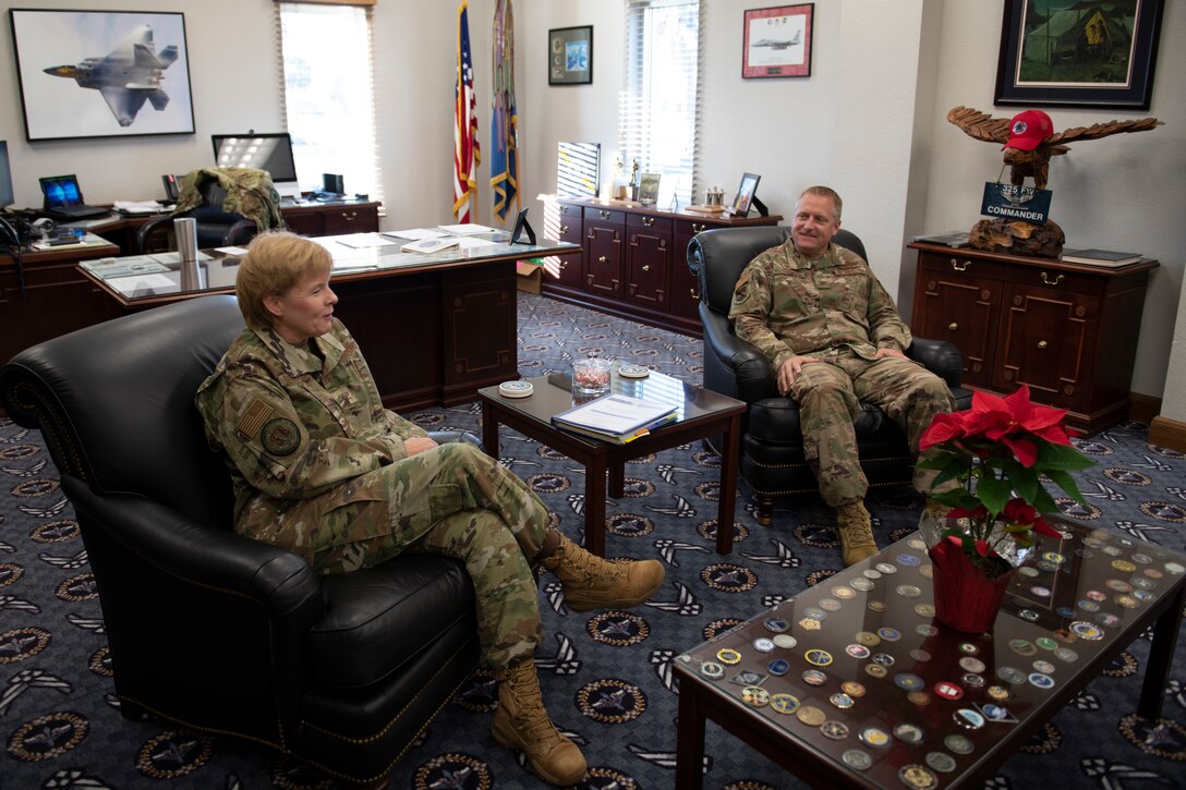U.S. Air Force Brig. Gen. Sharon Bannister, Air Combat Command Surgeon General, center, poses for a photo with U.S. Air Force Col. Brian Laidlaw, 325th Fighter Wing commander, right, at Tyndall Air Force Base, Florida, Dec. 19, 2019. Bannister toured the 325th Medical Group and met with Airmen, responded to questions, and viewed facilities currently operational. (U.S. Air Force photo by Senior Airman Stefan Alvarez)