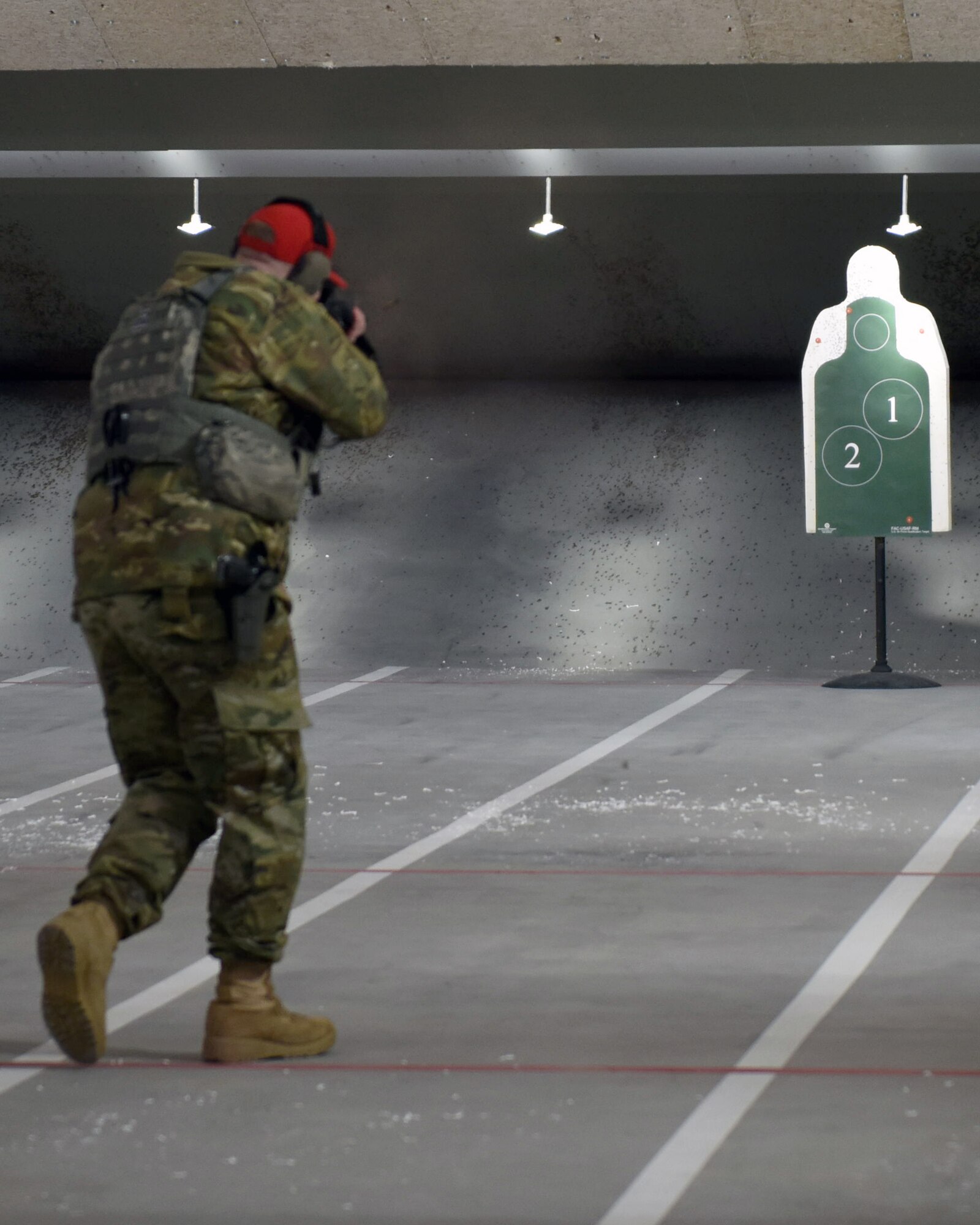 Staff Sgt. Britton Smith, 460th Security Forces Squadron combat arms instructor, demonstrates the capabilities of an M4 rifle at the 460th Security Forces Combat Arms Training and Maintenance Facility at Buckley Air Force Base, Colo., Dec. 19, 2019.