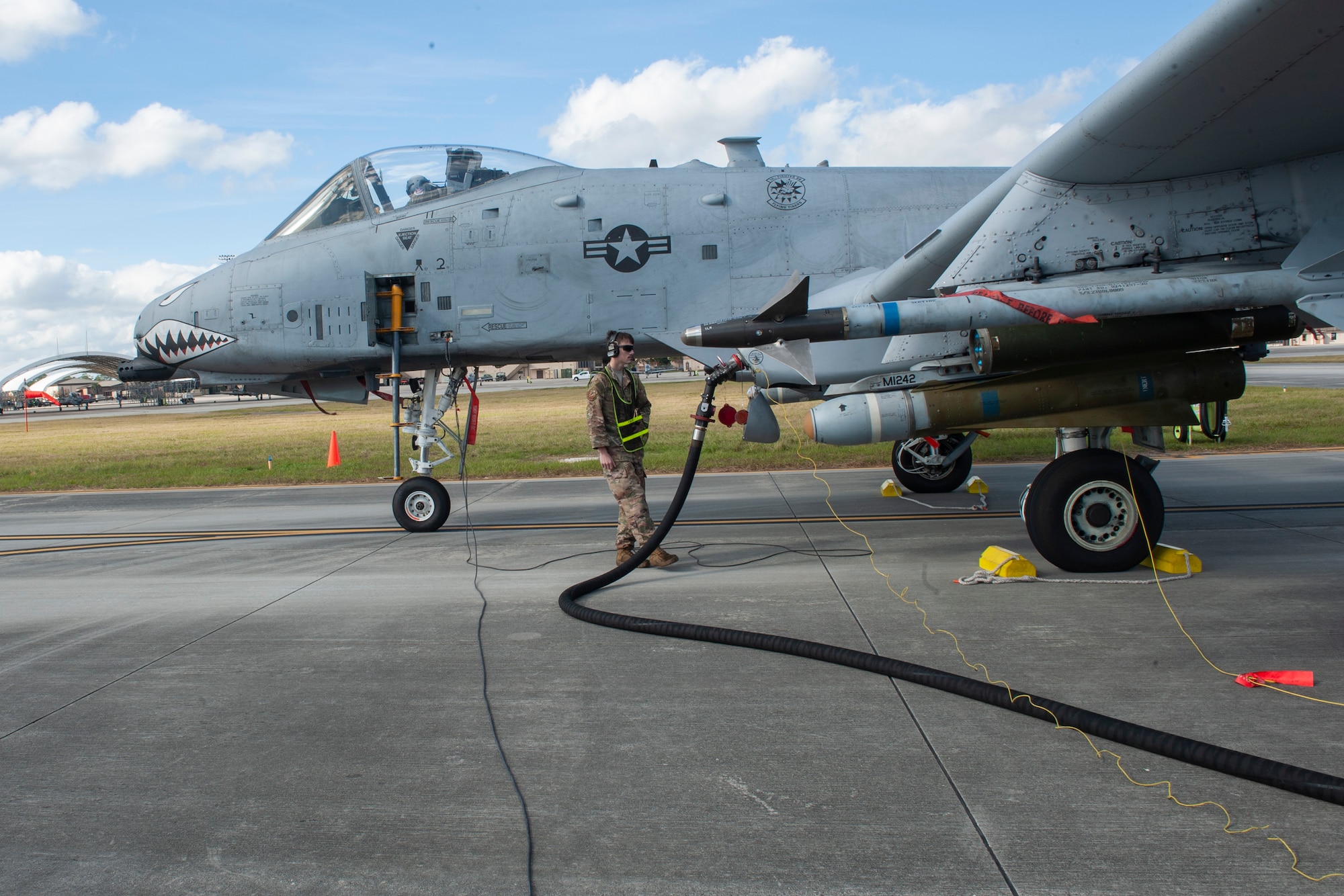 Photo of an Airman refueling an A-10C Thunderbolt II