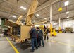 Photo of Electronics Mechanics Joe Czech and Dave Schrader, and Electronics Worker Brandon Pauselli.