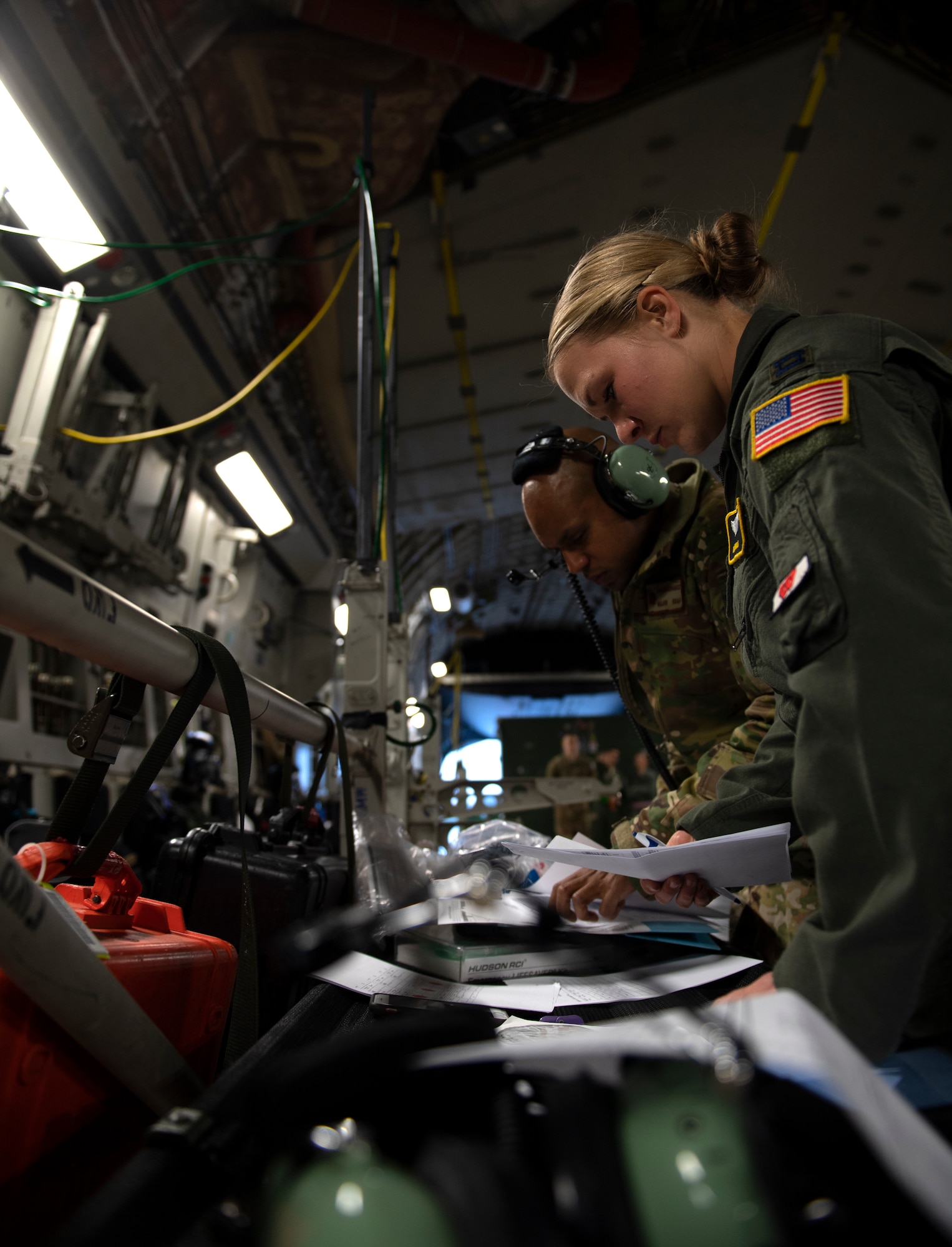 photos of Airmen practicing aeromedical evacuation on a C-17 Globemaster III from Travis AFB, California.