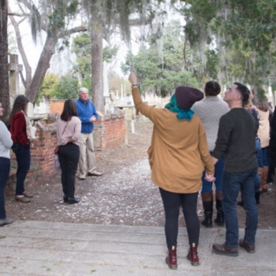 Military spouses explore the Cedar Grove Cemetery in New Bern, North Carolina, Dec. 6, 2019, during a tour hosted by the New Bern Chamber of Commerce Military Alliance as part of a Military spouse appreciation event. Established in 1800, The Cedar Grove Cemetery is one of the oldest public cemeteries in the region. The attendees learned about different important figures and landmarks of both New Bern’s, and the United States', history as they traversed the streets of Historic Downtown New Bern. (U.S. Marine Corps photo by Lance Cpl. Michael Neuenhoff)