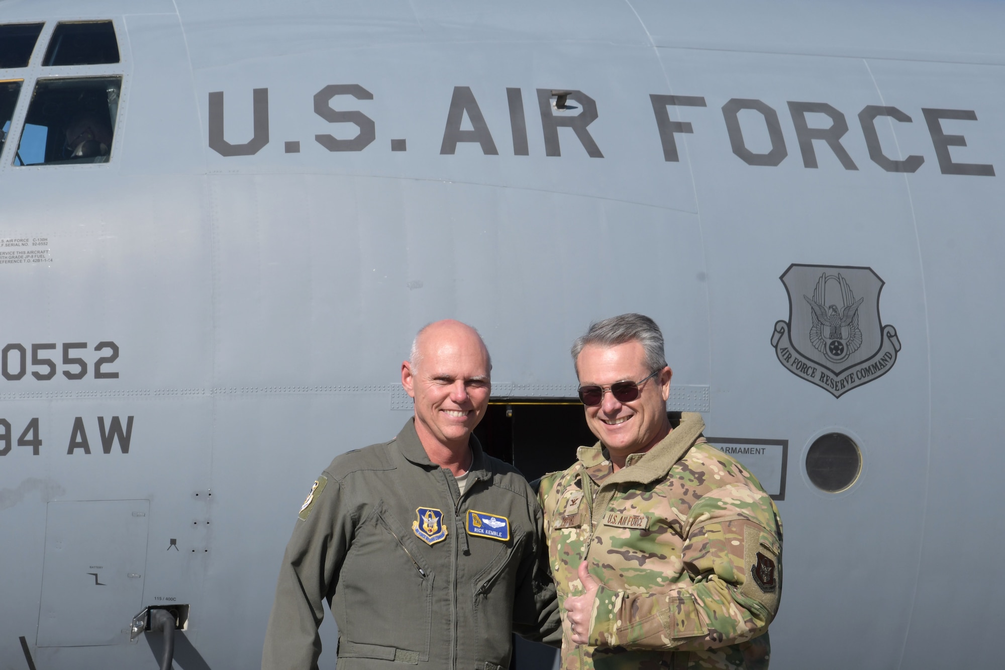 Brig. Gen. Richard Kemble, left, and Col. Craig McPike, 94th Airlift Wing commander, pose for a photo shortly after the general landed at Dobbins Air Reserve Base, Ga. on Dec. 20, 2019. The flight marked 6,000 flying hours for Kemble. (U.S. Air Force photo/Tech. Sgt. Andrew Park)