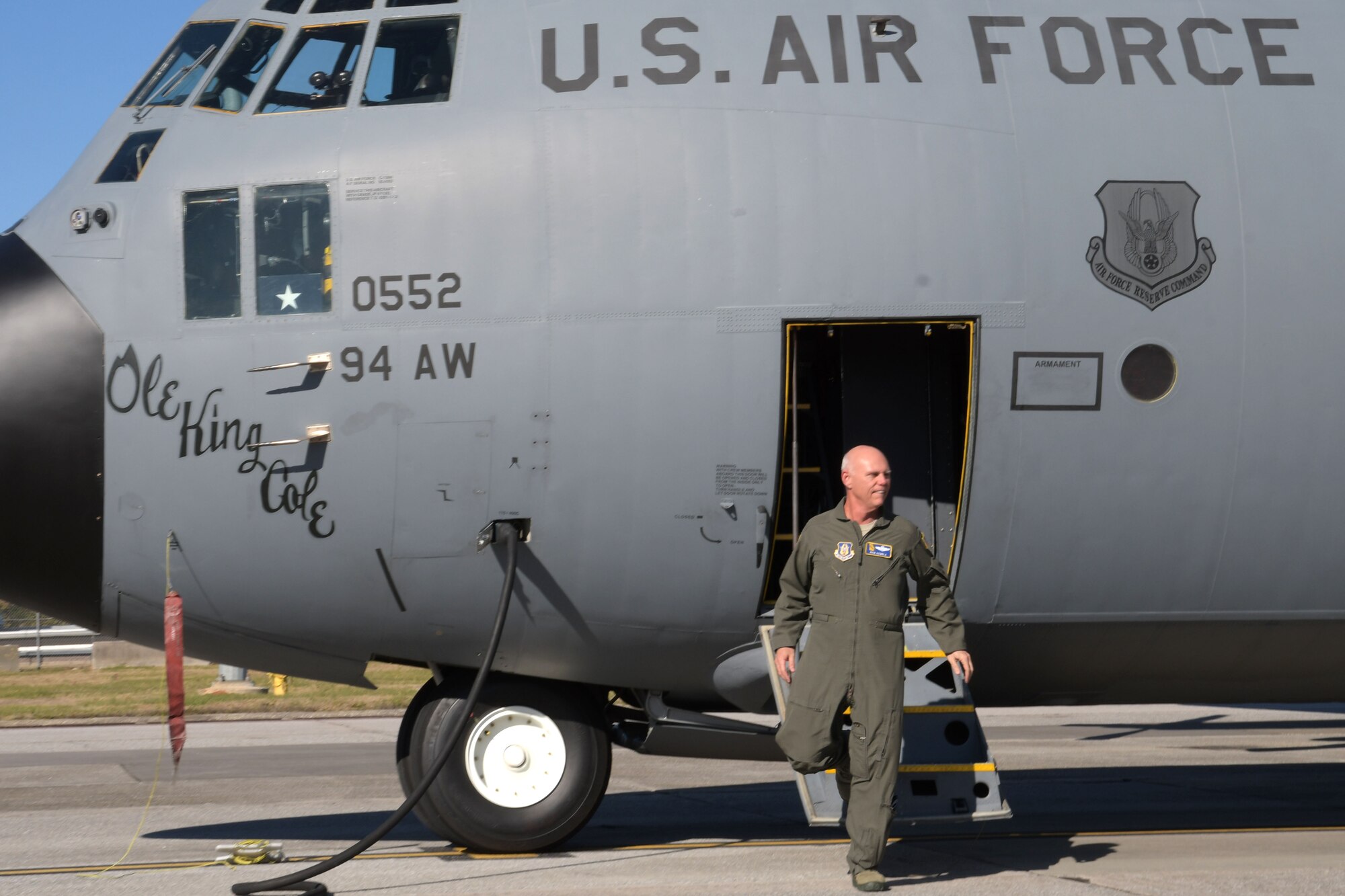 Brig. Gen. Richard Kemble, once the 94th Airlift Wing commander, departs a C-130H3 Hercules shortly after landing at Dobbins Air Reserve Base, Ga. on Dec. 20, 2019. The flight marked 6,000 flying hours for Kemble. (U.S. Air Force photo/Tech. Sgt. Andrew Park)