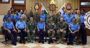U.S. and Indian military service members pose for a group photo during a medical subject matter expert exchange at Indian Naval Hospital Kalyani, Visakhapatnam, India, Nov. 15, 2019. The SMEE focused on lessons learned and humanitarian assistance and disaster relief operations table top exercises in a post-disaster environment, where roads, air, and seaports are no longer accessible due to a natural disaster. (Courtesy photo)