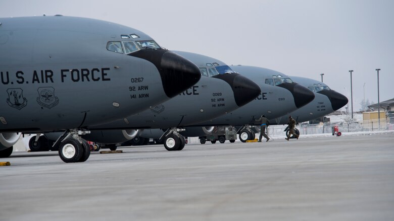 Team Fairchild Aircrew Airmen perform a pre-flight check during a simulated alert response during Exercise Titan Fury at Fairchild Air Force Base, Washington, Dec. 9, 2019.