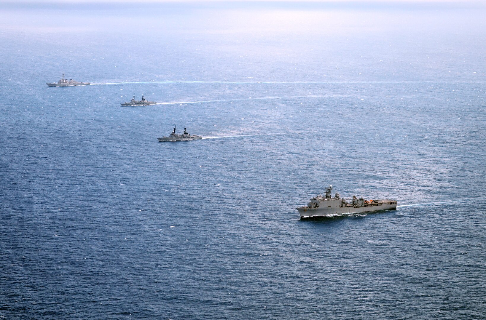 The Arleigh Burke-class destroyer USS John S. McCain (DDG 56), top, the Philippine navy frigates BRP Gregaorio del Pilar (PF-15) and BRP Ramon Alcaraz (PF-16), and the Whidbey Island-class amphibious dock landing ship USS Ashland (LSD 48) are underway in formation during Cooperation Afloat Readiness and Training (CARAT) Philippines 2014. In its 20th year, CARAT is a bilateral exercise series between the United States and the armed forces of nine partner nations in South and Southeast Asia. (U.S Navy photo by Mass Communication Specialist 1st Class Jay C. Pugh/Released)