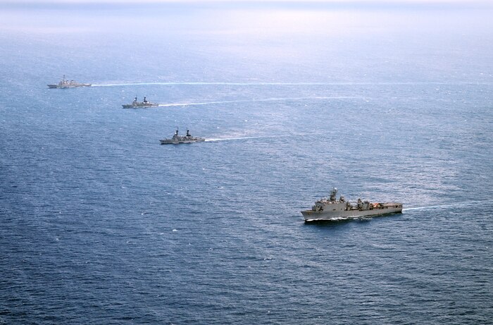 The Arleigh Burke-class destroyer USS John S. McCain (DDG 56), top, the Philippine navy frigates BRP Gregaorio del Pilar (PF-15) and BRP Ramon Alcaraz (PF-16), and the Whidbey Island-class amphibious dock landing ship USS Ashland (LSD 48) are underway in formation during Cooperation Afloat Readiness and Training (CARAT) Philippines 2014. In its 20th year, CARAT is a bilateral exercise series between the United States and the armed forces of nine partner nations in South and Southeast Asia. (U.S Navy photo by Mass Communication Specialist 1st Class Jay C. Pugh/Released)