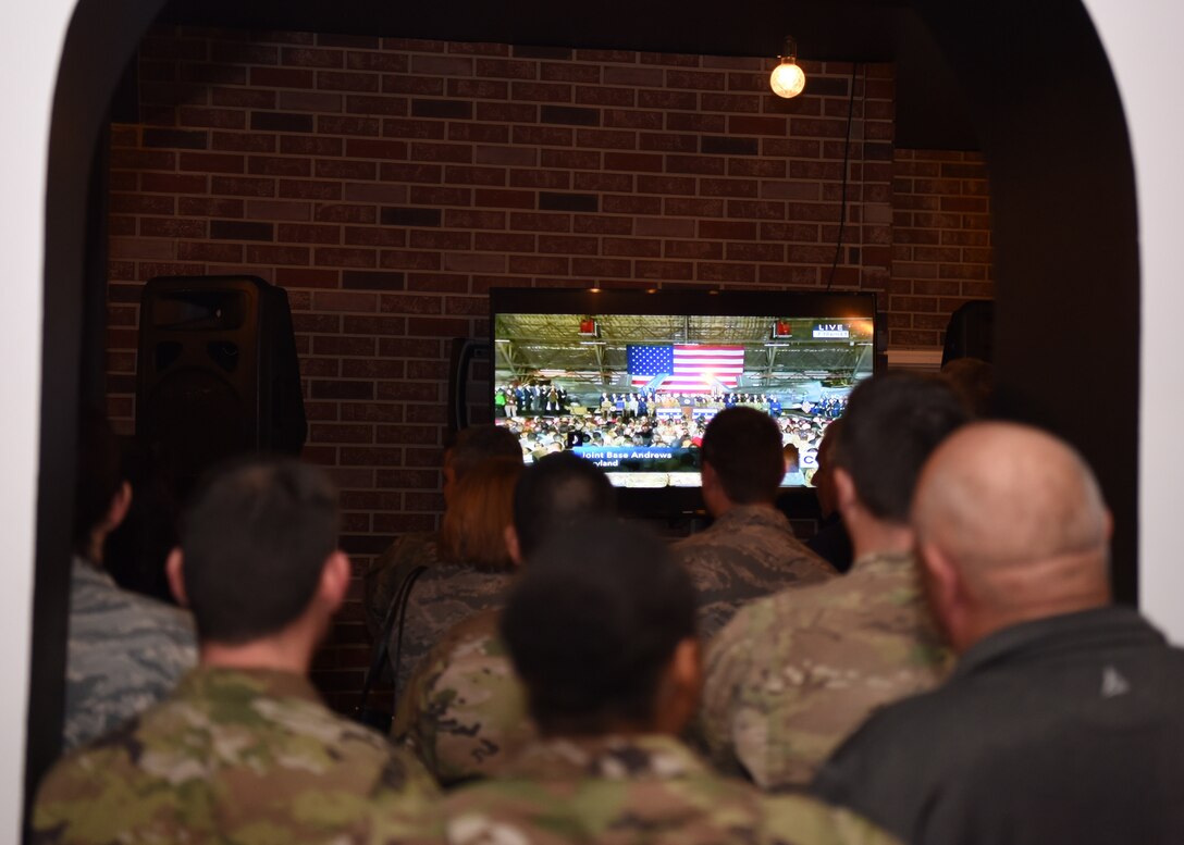 Vandenberg Air Force Base members wait for President Donald Trump to sign the National Defense Authorization Act Dec. 20, 2019, at Vandenberg AFB, Calif. The NDAA established a sixth branch of the armed forces – the United States Space Force. The U.S. Space Force is a military service that organizes, trains, and equips space forces in order to protect U.S. and allied interests in space and to provide space capabilities to the joint force. U.S. Space Force responsibilities will include developing military space professionals, acquiring military space systems, maturing the military doctrine for space power, and organizing space forces to present to our Combatant Commands. (U.S. Air Force photo by Airman 1st Class Hanah Abercrombie)