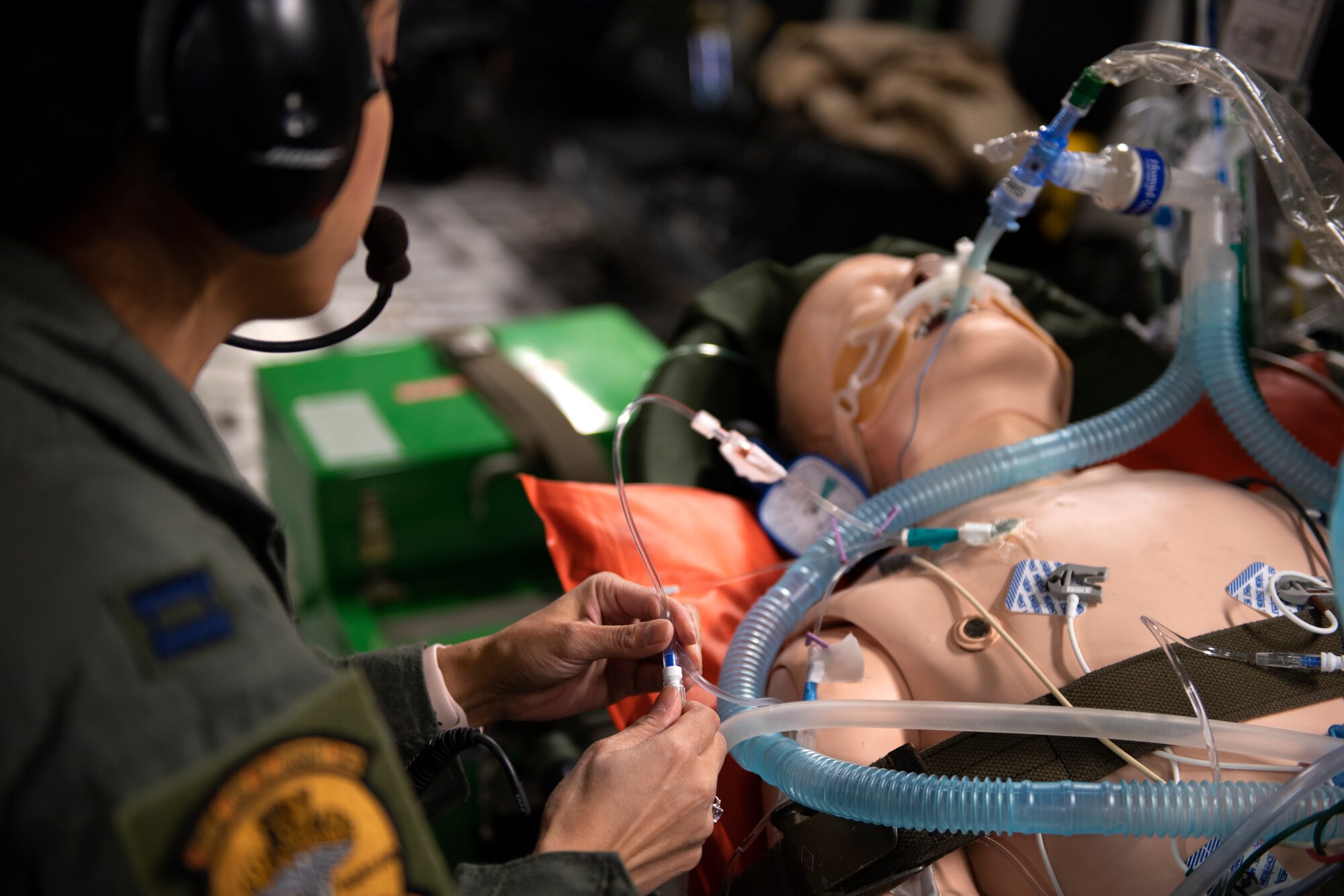 photos of Airmen practicing aeromedical evacuation on a C-17 Globemaster III from Travis AFB, California.