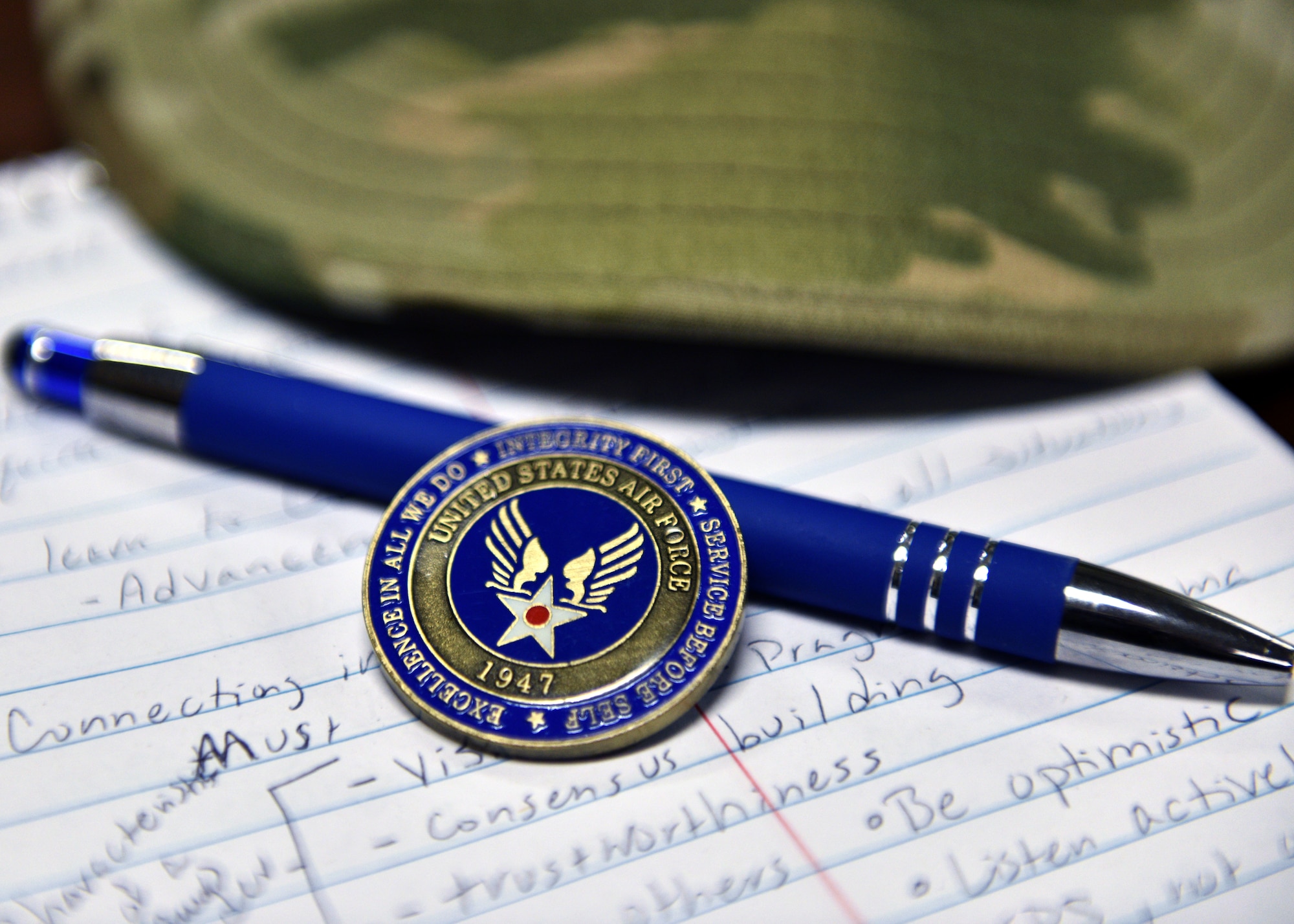 The Airman’s coin is a tradition in recognition of taking the first step to becoming a leader in the U.S. Air Force. Following Basic Military Training, Airmen are challenged to take on leadership roles and become mentors to their peers. (U.S. Air Force photo by Airman 1st Class Robyn Hunsinger)