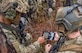 Members of the 6th Special Operations Squadron use a tablet to upload coordinates during an exercise showcasing the capabilities of the Advanced Battle Management System at Duke Field, Fla., Dec. 17, 2019. During the first demonstration of the ABMS, operators across the Air Force, Army, Navy and industry tested multiple real-time data sharing tools and technology in a homeland defense-based scenario enacted by U.S. Northern Command and enabled by Air Force senior leaders. The collection of networked systems and immediately available information is critical to enabling joint service operations across all domains. (U.S. Air Force photo by Tech. Sgt. Joshua J. Garcia)