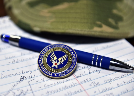 The Airman’s coin is a tradition in recognition of taking the first step to becoming a leader in the U.S. Air Force. Following Basic Military Training, Airmen are challenged to take on leadership roles and become mentors to their peers. (U.S. Air Force photo by Airman 1st Class Robyn Hunsinger)