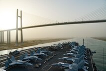191213-N-NQ487-0025 SUEZ CANAL (Dec. 13, 2019) The Nimitz-class aircraft carrier USS Harry S. Truman (CVN 75) transits the Suez Canal Dec. 13, 2019. The Harry S. Truman Carrier Strike Group is deployed to the U.S. 5th Fleet area of operations in support of naval operations to ensure maritime stability and security in the Central Region, connecting the Mediterranean and the Pacific through the western Indian Ocean and three strategic choke points. (U.S. Navy photo by Mass Communication Specialist 3rd Class Kaysee Lohmann/Released)