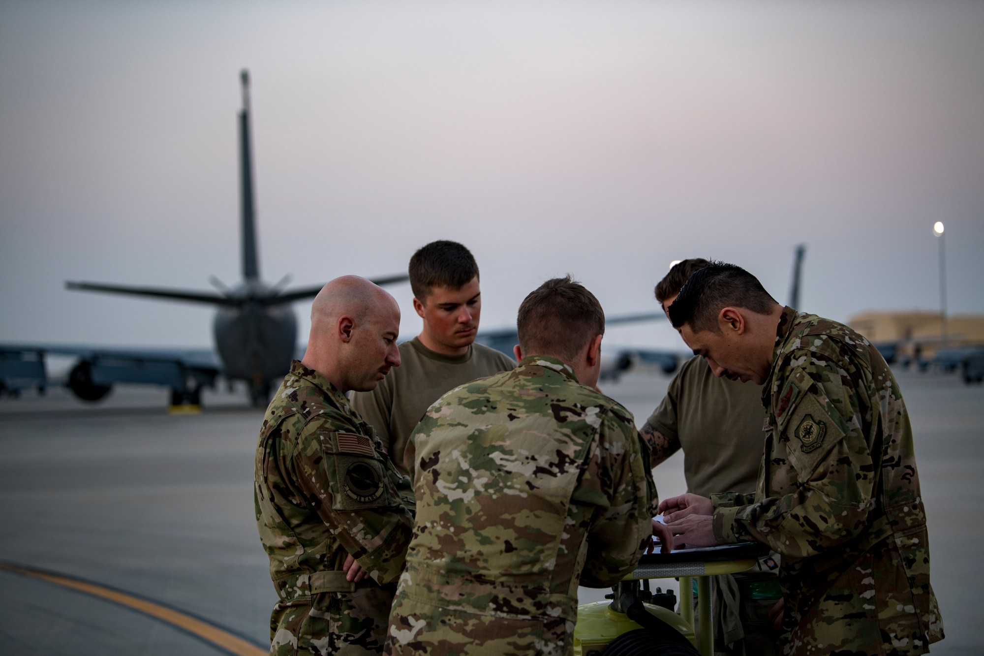 U.S. Air Force KC-135 Stratotanker aircrew members with the 28th Expeditionary Air Refueling Squadron conduct a preflight briefing at Al Udeid Air Base, Qatar, Dec. 6, 2019.