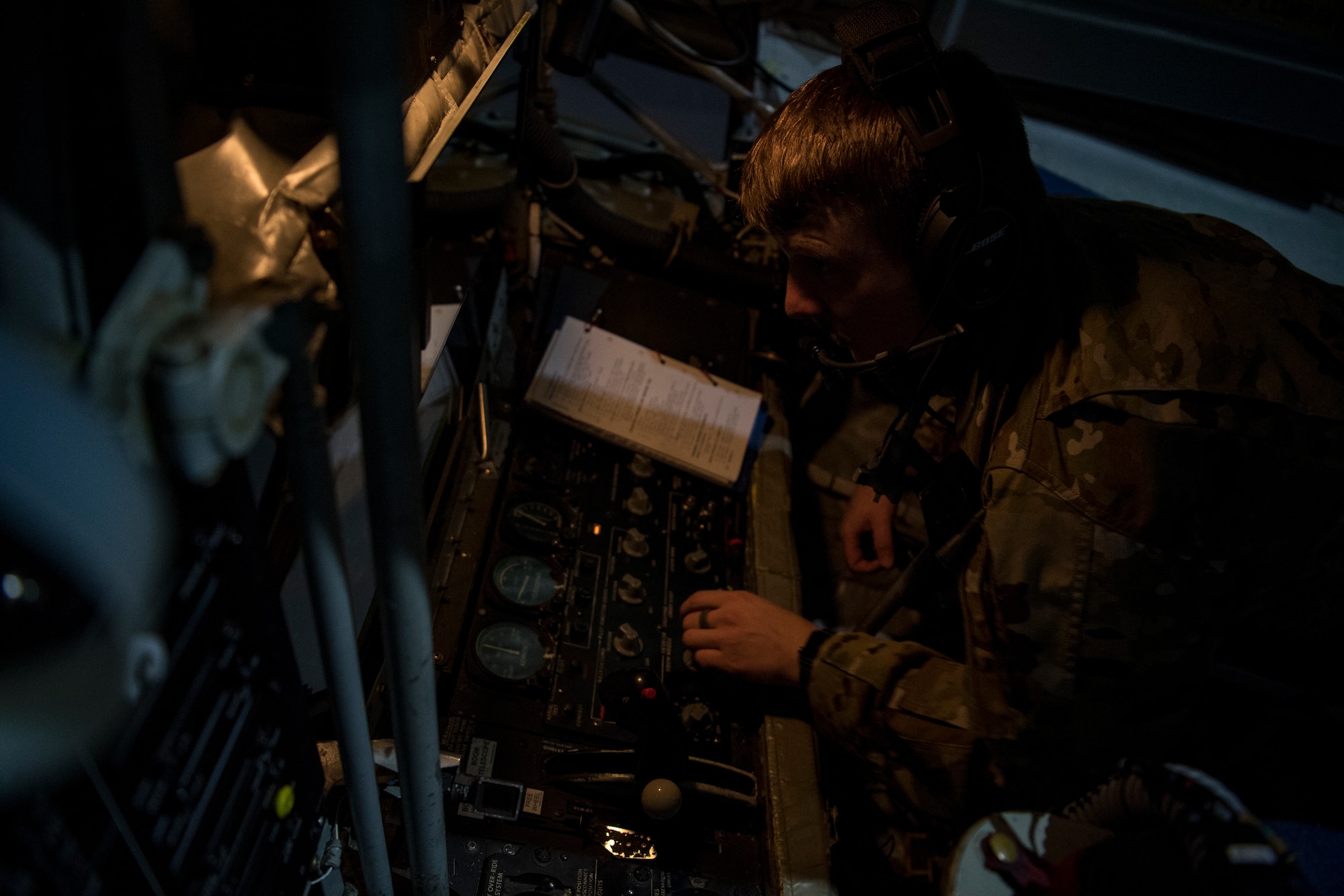 A U.S. Air Force KC-135 Stratotanker boom operator with the 28th Expeditionary Air Refueling Squadron conducts a preflight inspection at Al Udeid Air Base, Qatar, Dec. 6, 2019.