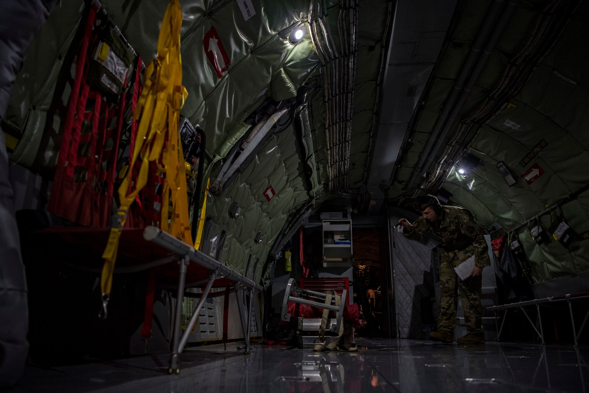 A U.S. Air Force KC-135 Stratotanker boom operator with the 28th Expeditionary Air Refueling Squadron conducts a preflight inspection at Al Udeid Air Base, Qatar, Dec. 6, 2019.