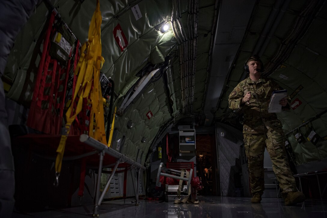 A U.S. Air Force KC-135 Stratotanker boom operator with the 28th Expeditionary Air Refueling Squadron conducts a preflight inspection at Al Udeid Air Base, Qatar, Dec. 6, 2019.