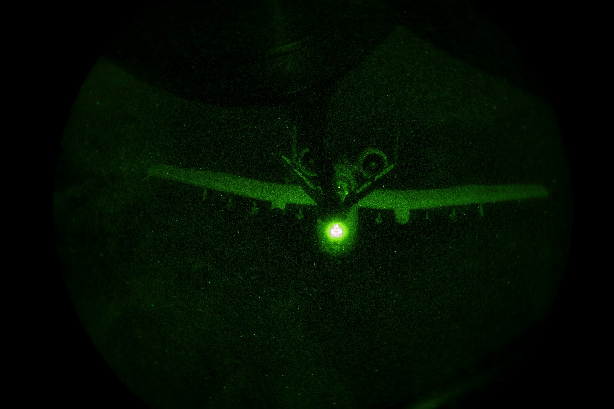 A U.S. Air Force KC-135 Stratotanker boom operator with the 28th Expeditionary Air Refueling Squadron conducts an aerial refueling to a U.S. Air Force A-10 Thunderbolt II above Eastern Afghanistan, Dec. 6, 2019.