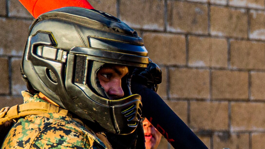 A U.S. Marine with 3rd Marine Regiment prepares for a pugil stick bout during a regimental squad competition on Marine Corps Base Hawaii, Dec. 19.