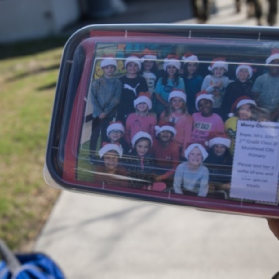 A homemade cookie package is displayed during the annual cookie drop event at Marine Corps Air Station Cherry Point, North Carolina, Dec. 16, 2019. The cookie drop organized by Carteret County’s Chamber of Commerce’s Military Affairs Committee, donates baked goods to the Marines and Sailors on duty at the air station. Elementary school students from Carteret County made unique Christmas cards in the boxes to wish the service members a happy holiday season. (U.S. Marine Corps photo by Cpl. Micha Pierce)