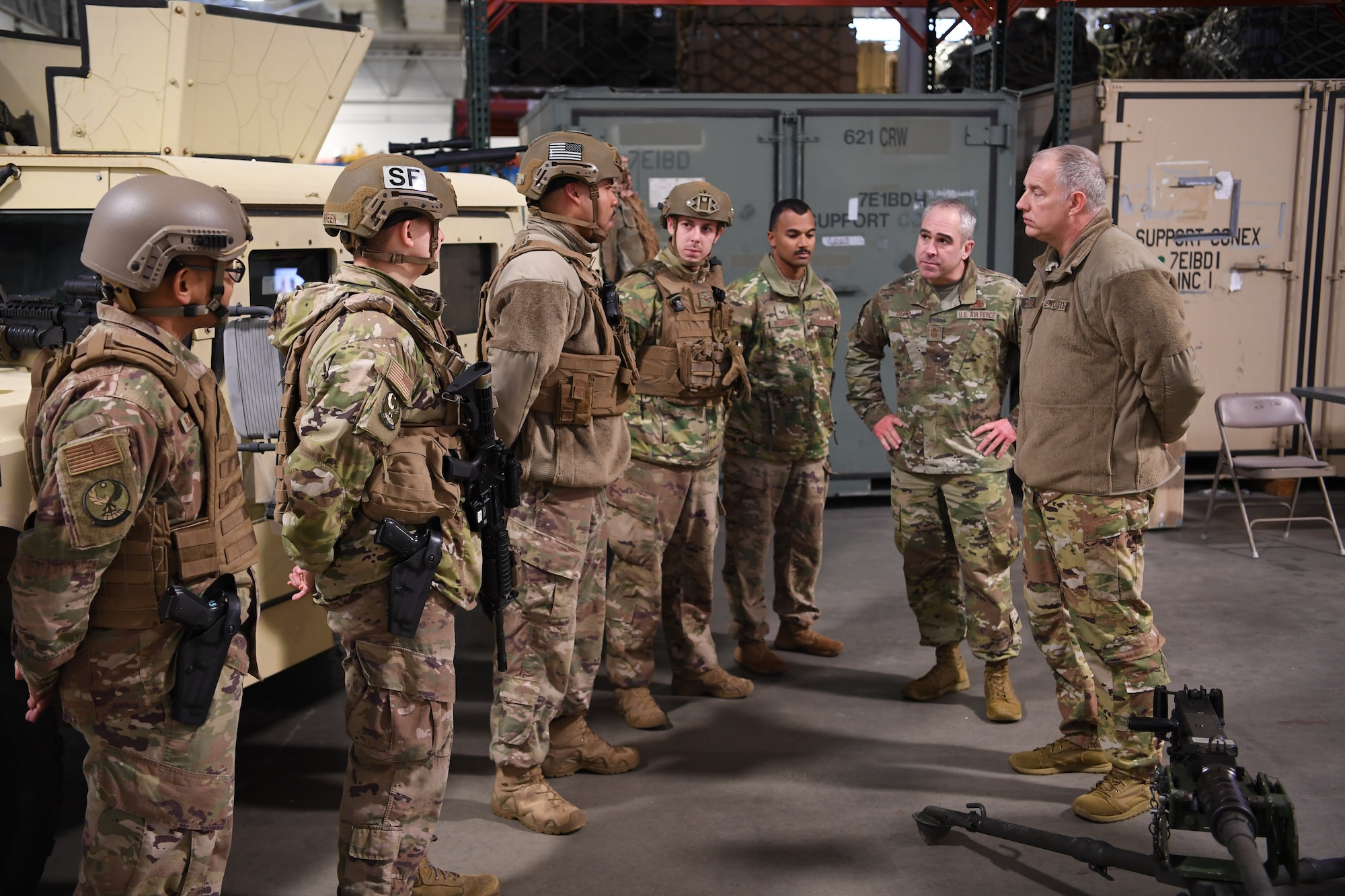 Maj. Gen. John Gordy (right), U.S. Air Force Expeditionary Center commander, speaks with Airmen from the 621st Contingency Response Wing at the Global Deployment Readiness Center, Joint Base McGuire-Dix-Lakehurst, New Jersey Dec. 17, 2019. Gordy along with Chief Master Sgt. Kristopher Berg, USAF EC command chief, spent the day learning about the CRW mission. (U.S. Air Force photo by Tech. Sgt. Luther Mitchell)