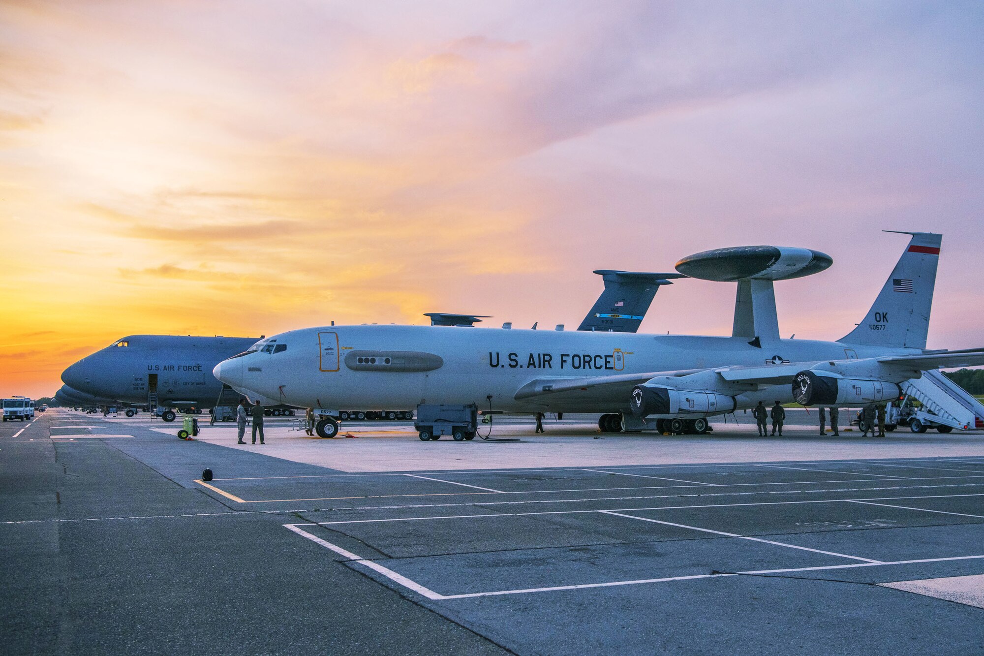 Airmen from the 436th Maintenance Squadron service a U.S. Air Force E-3 Sentry Airborne Warning and Control System aircraft assigned to 552nd Air Control Wing, from Tinker Air Force Base, Oklahoma, May 17, 2019, at Dover Air Force Base, Del. The aircraft spent the weekend at Dover AFB due to severe spring weather threatening the Plains and Midwest. (U.S. Air Force photo by Staff Sgt. Zoe Russell)