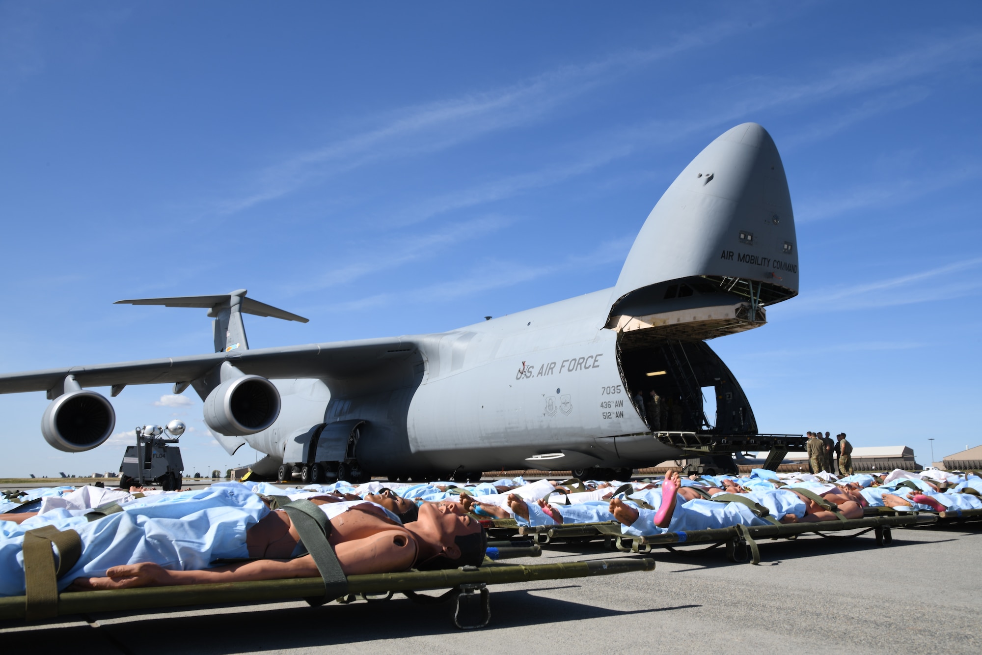 Mannequins lie in position prior to the aeromedical evacuation demonstration for media day at Fairchild Air Force Base, Wash., Sept. 24, 2019, in support of exercise Mobility Guardian 2019. Exercise Mobility Guardian is Air Mobility Command's premier large-scale mobility exercise. Through robust and relevant training, Mobility Guardian improves the readiness and capabilities of Mobility Airmen to deliver rapid global mobility and builds a more lethal and ready Air Force. (U.S. Air Force photo by Tech. Sgt. Esteban Esquivel).