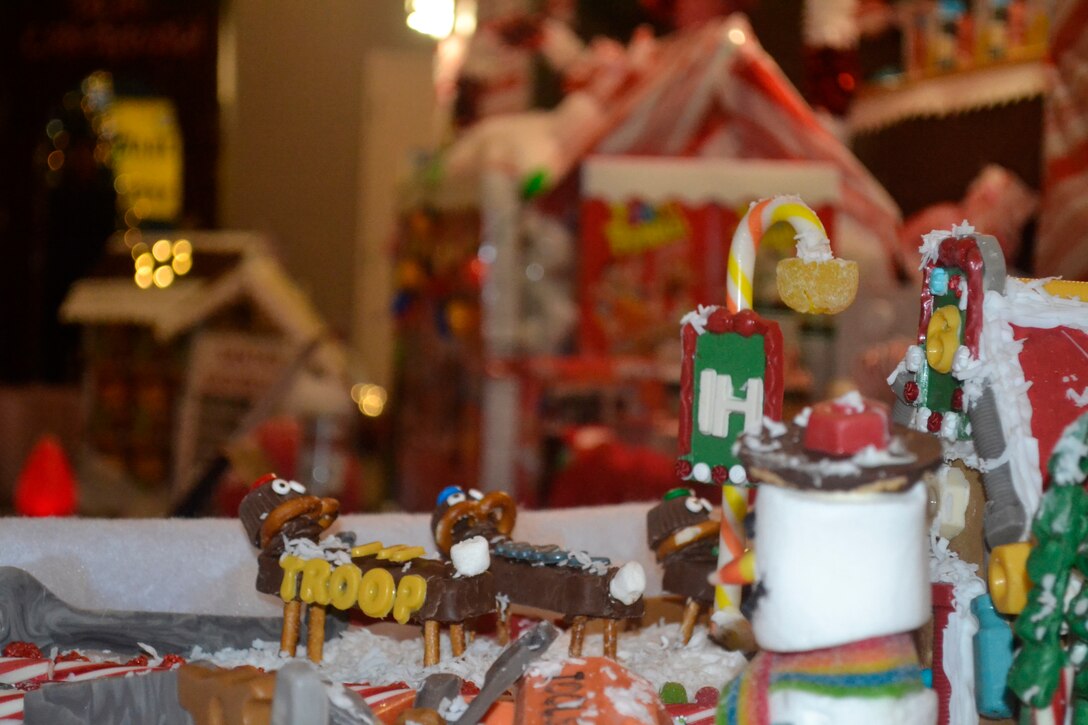 A gingerbread house sits at the edge of a winter village constructed by employees at DLA Troop Support’s Industrial Hardware supply chain in Philadelphia Dec. 20, 2019 as part of a holiday decorating contest.